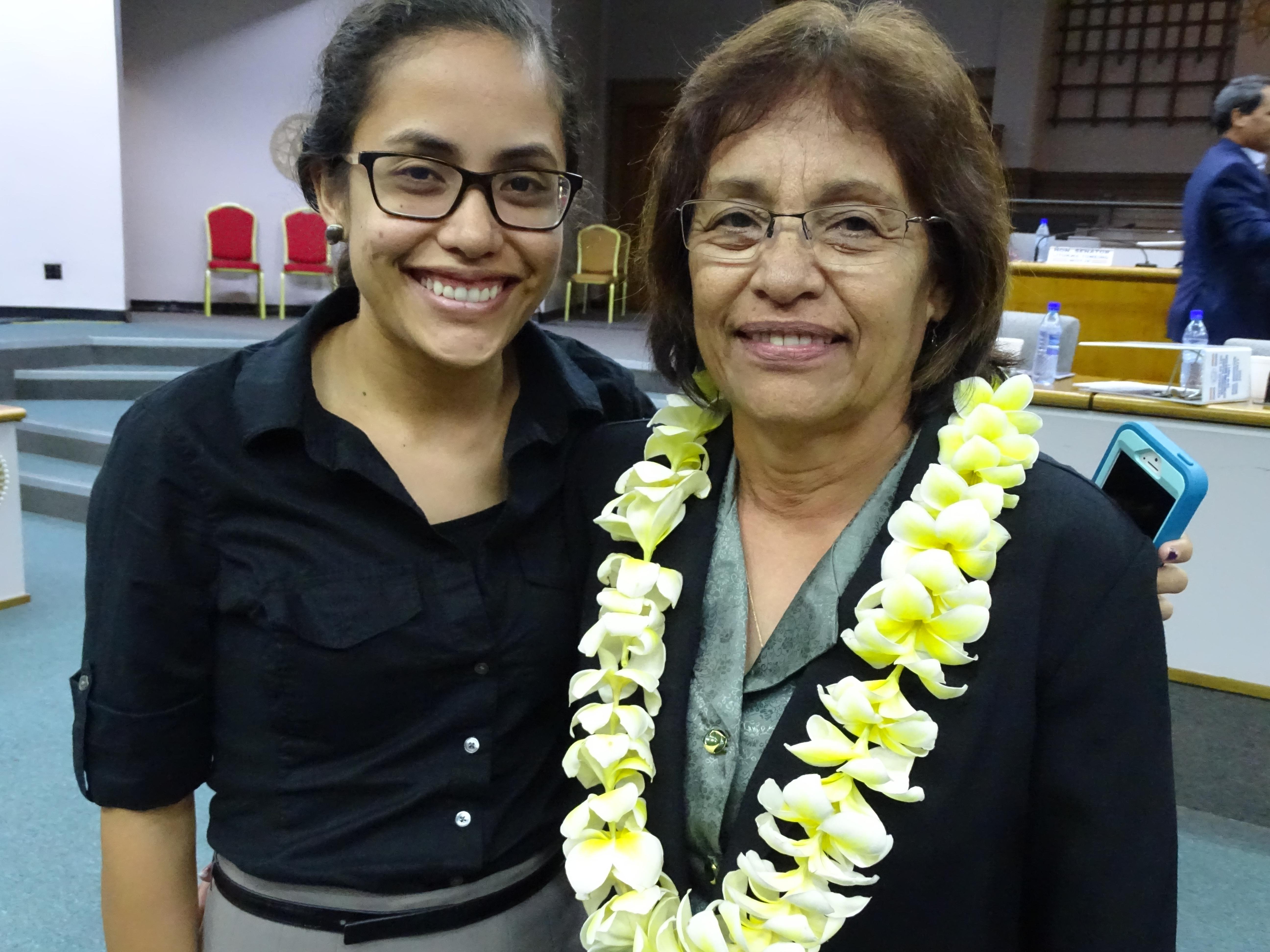 Then-President Hilda Heine, right, with daughter Kathy Jetnil-Kijiner, minutes after being elected the first female president of the Marshall Islands in January 2016, was targeted for "revenge" by proponents of a controversial foreign investment scheme, said criminal charges filed by the U.S. Justice Department in New York.