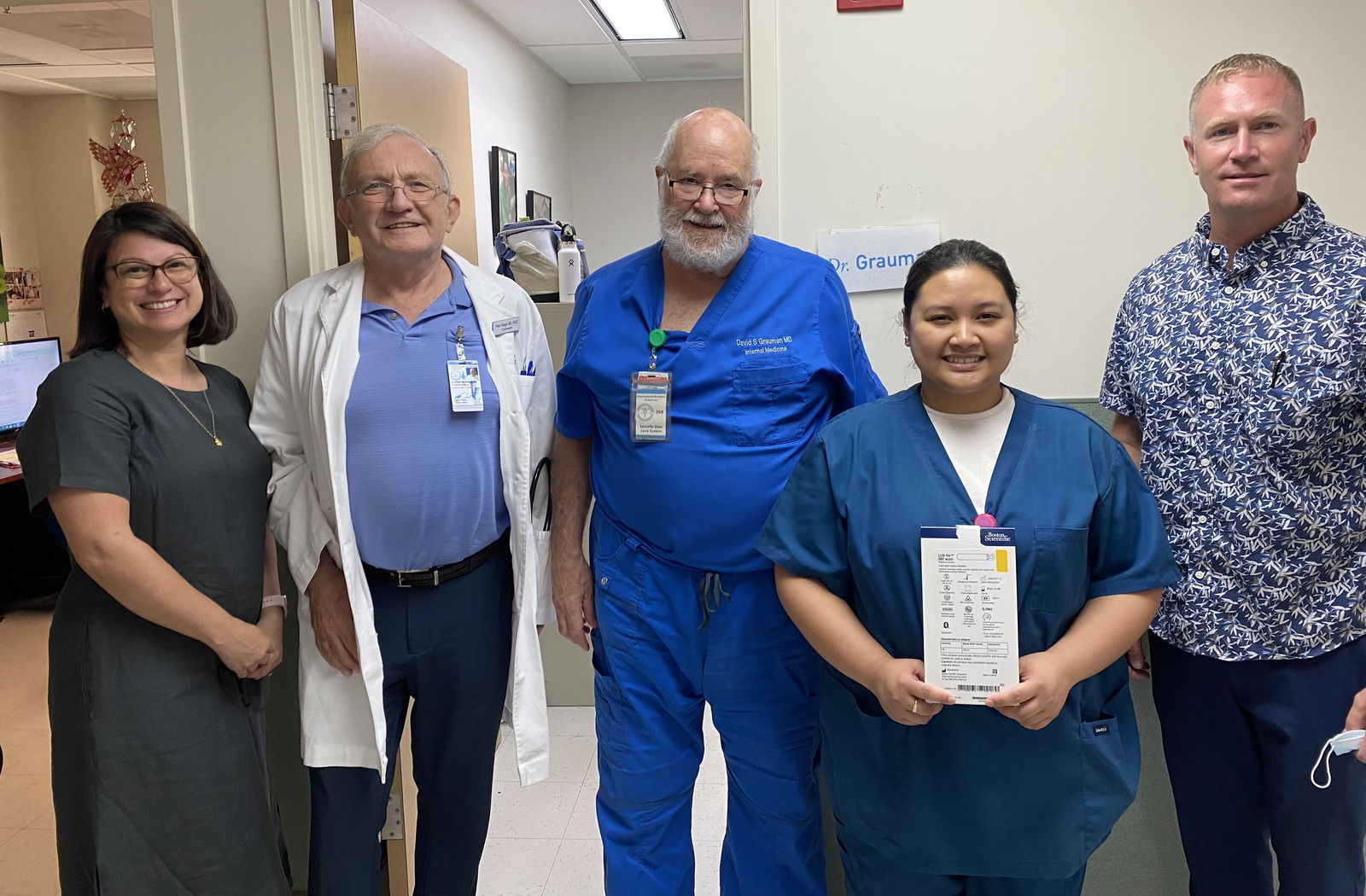 The CHCC surgery team pose with the first internal heart monitors used in the CNMI.