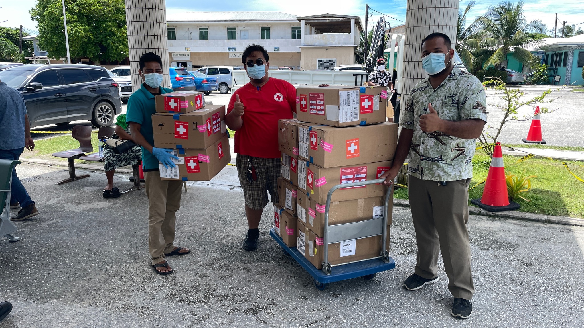 In mid-August, the American Samoa government dispatched hundreds of doses of PaxLovid to help the Marshall Islands with its outbreak. Receiving the donation in this file photo are Ministry of Health and Human Services and Red Cross representatives. The Marshall Islands has now sent PaxLovid to Chuuk to help it prepare for Covid when its border opens.