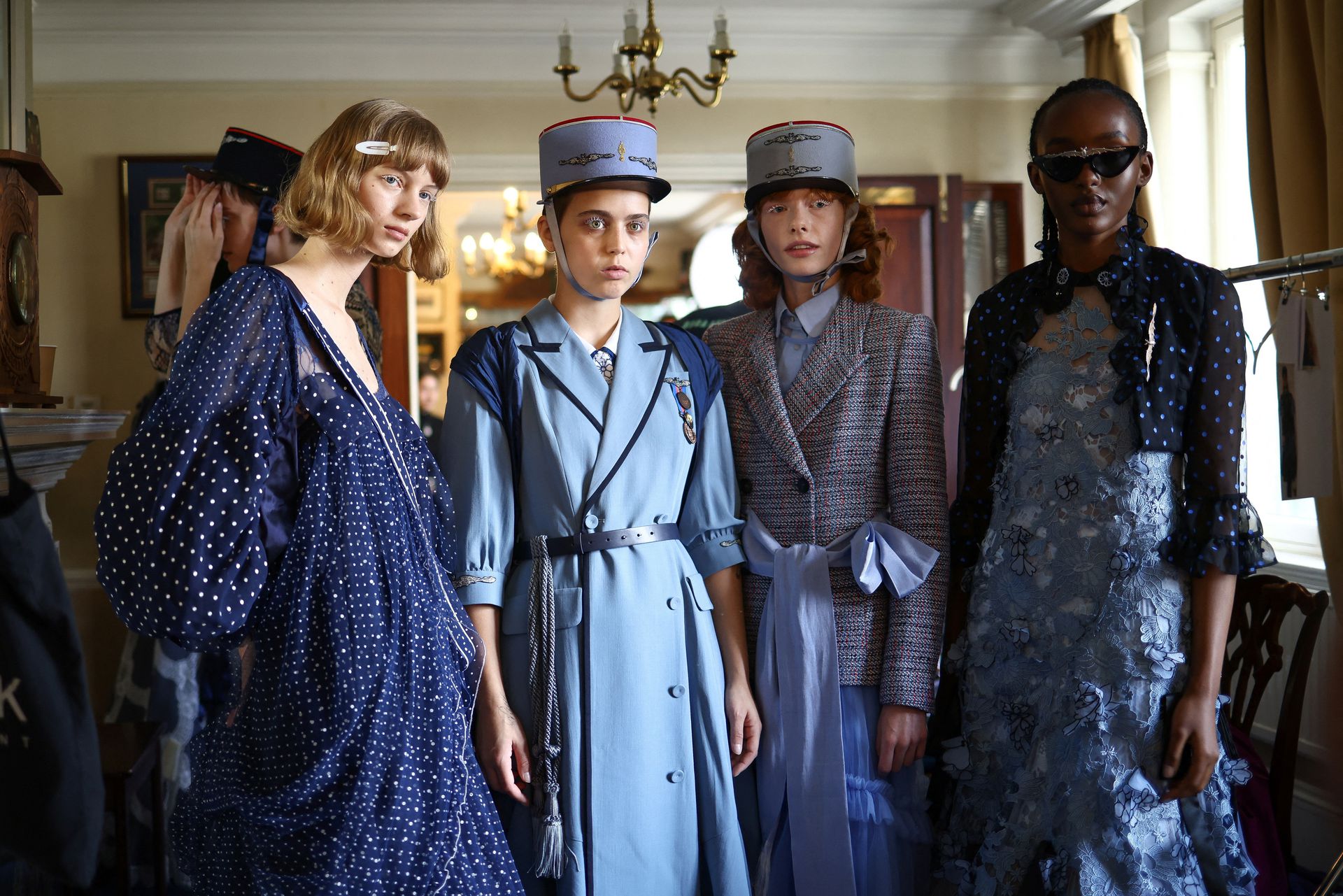 Models prepare backstage ahead of the Bora Aksu catwalk show during London Fashion Week in London, Britain, Sept. 16, 2022.