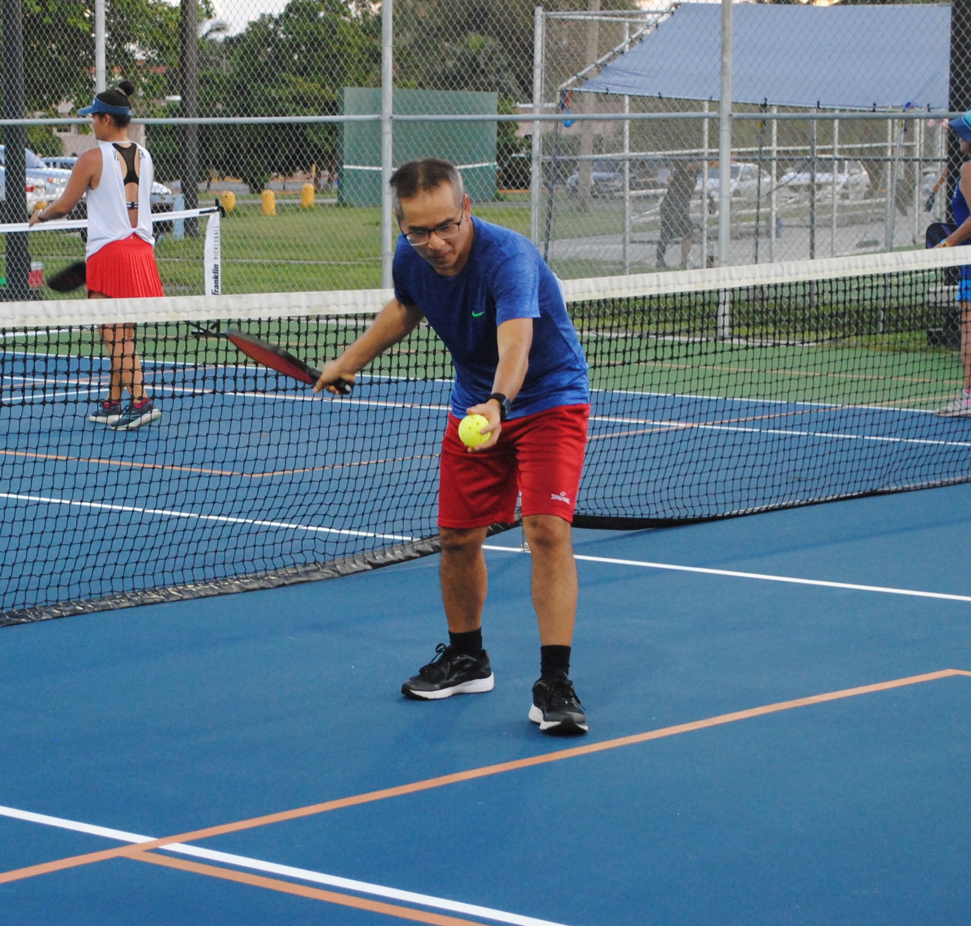 Thai Nguyen attempts a serve.