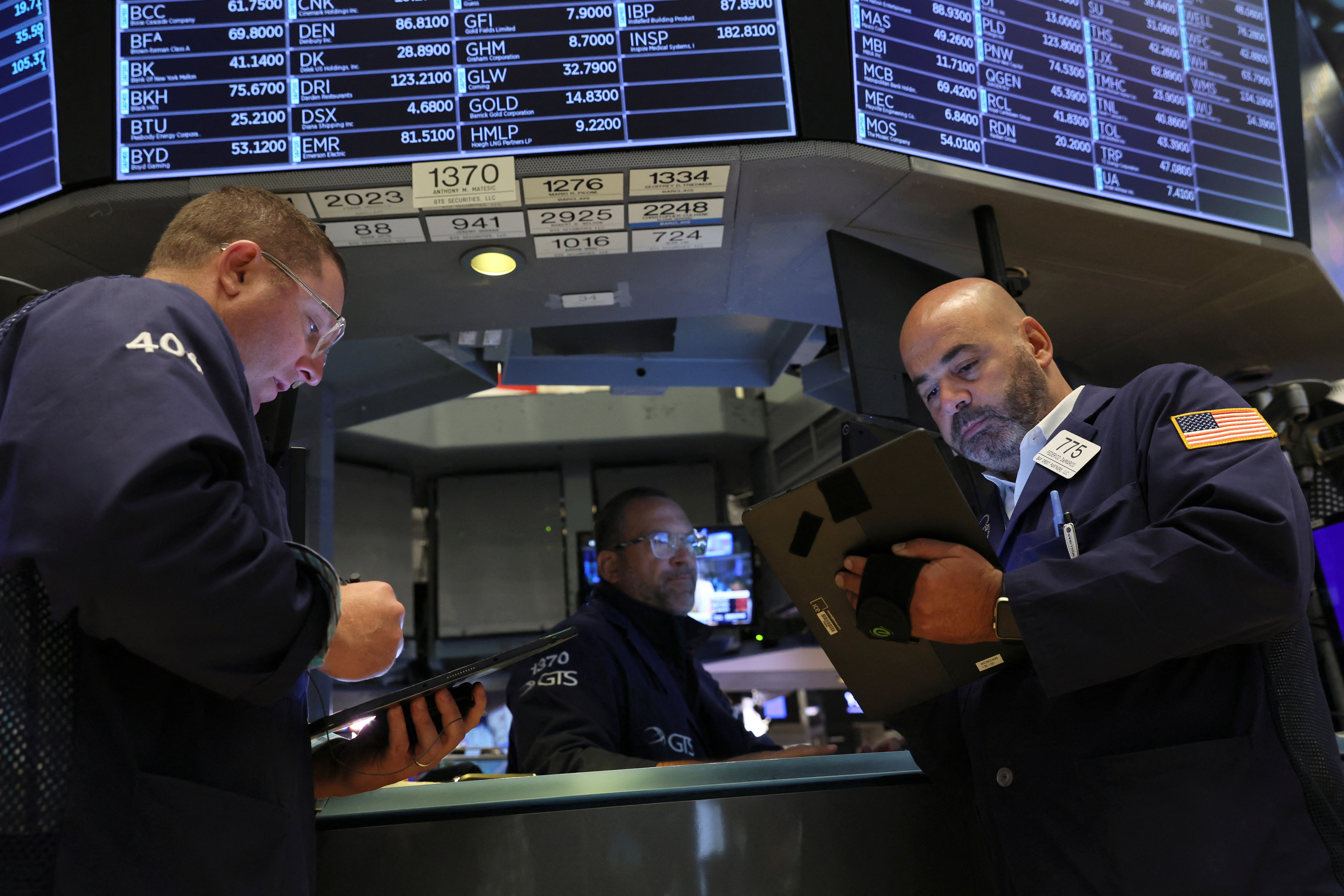 Traders work on the floor of the New York Stock Exchange, Sept. 7, 2022.