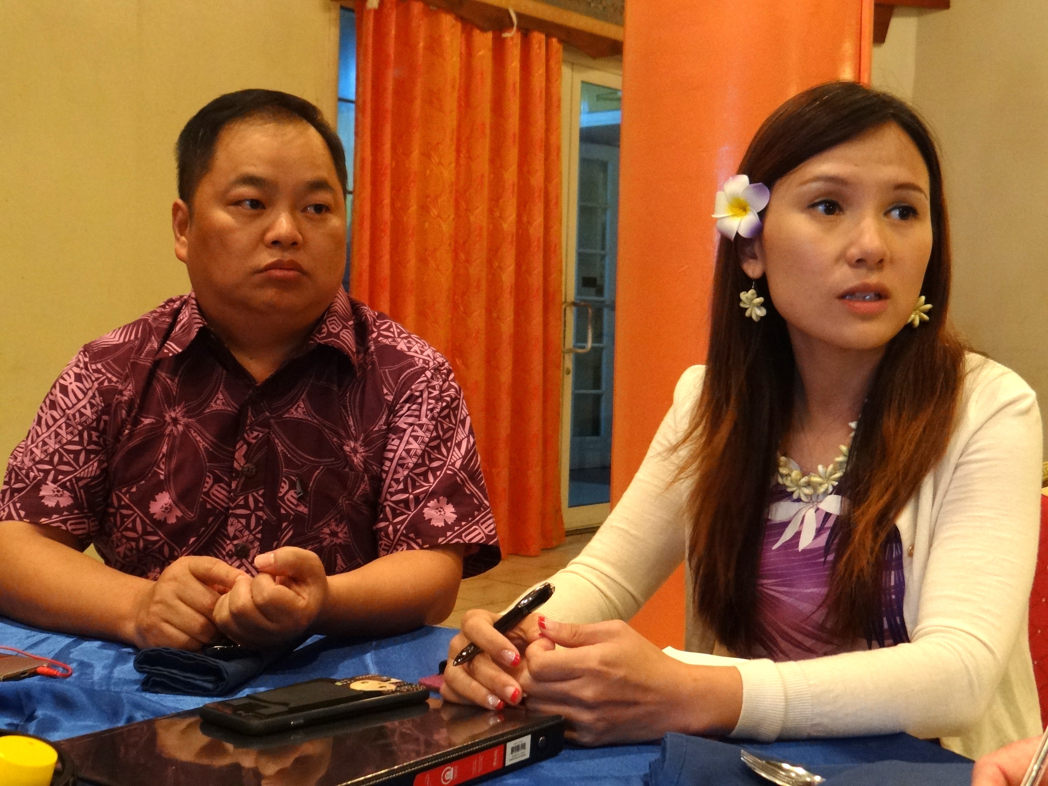 Cary Yan and his associate Gina Zhou in a file photo from 2019 during an interview in Majuro. They have been charged in New York  with violating the U.S. Foreign Corrupt Practices Act for allegedly bribing elected leaders and engaging in money laundering “designed to influence and manipulate the legislative process” in the Marshall Islands.