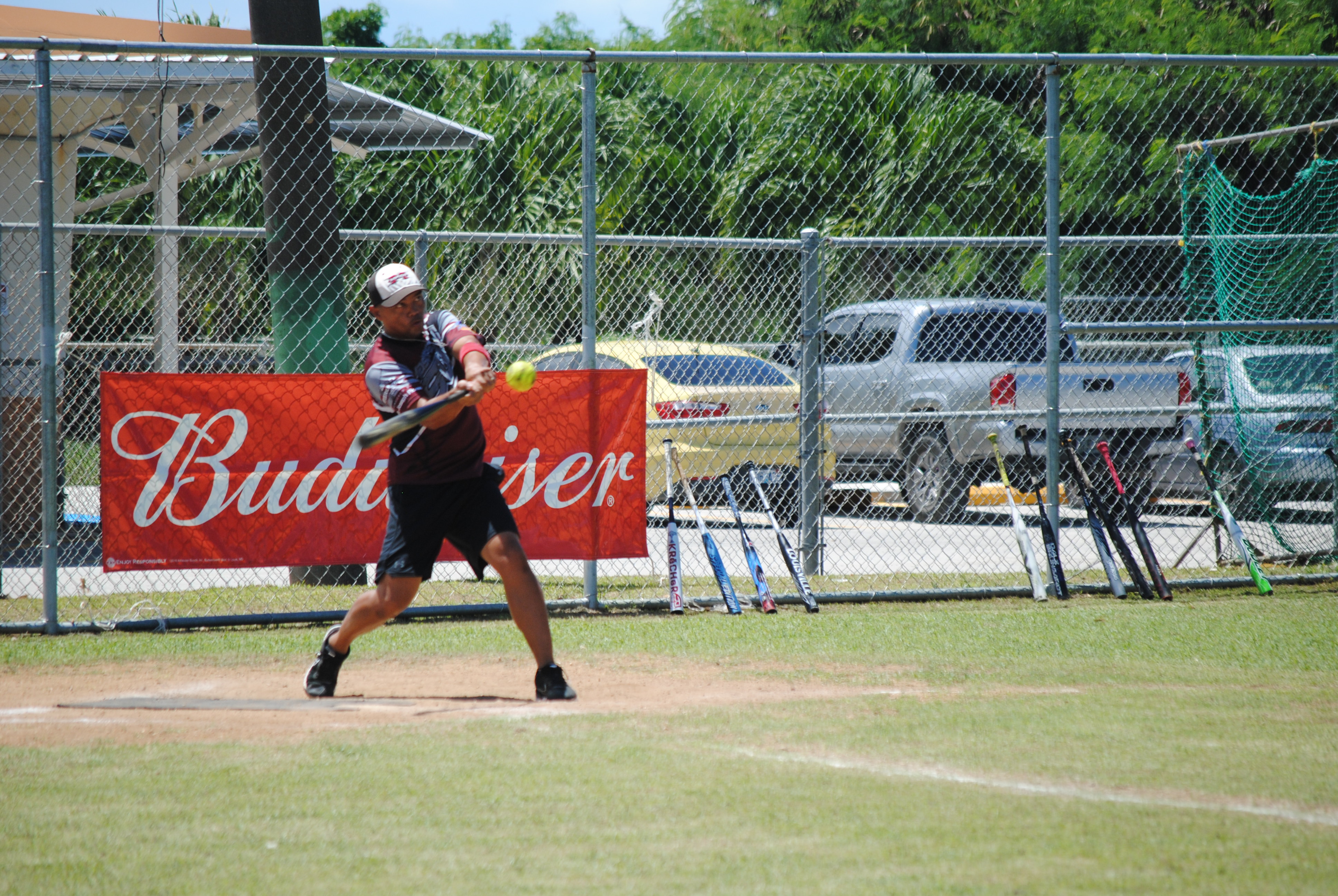 SUFA's Paul Salalila connects for the homerun during a 2022 Budweiser Belau Amateur Softball League game Sunday at the Dandan baseball field.