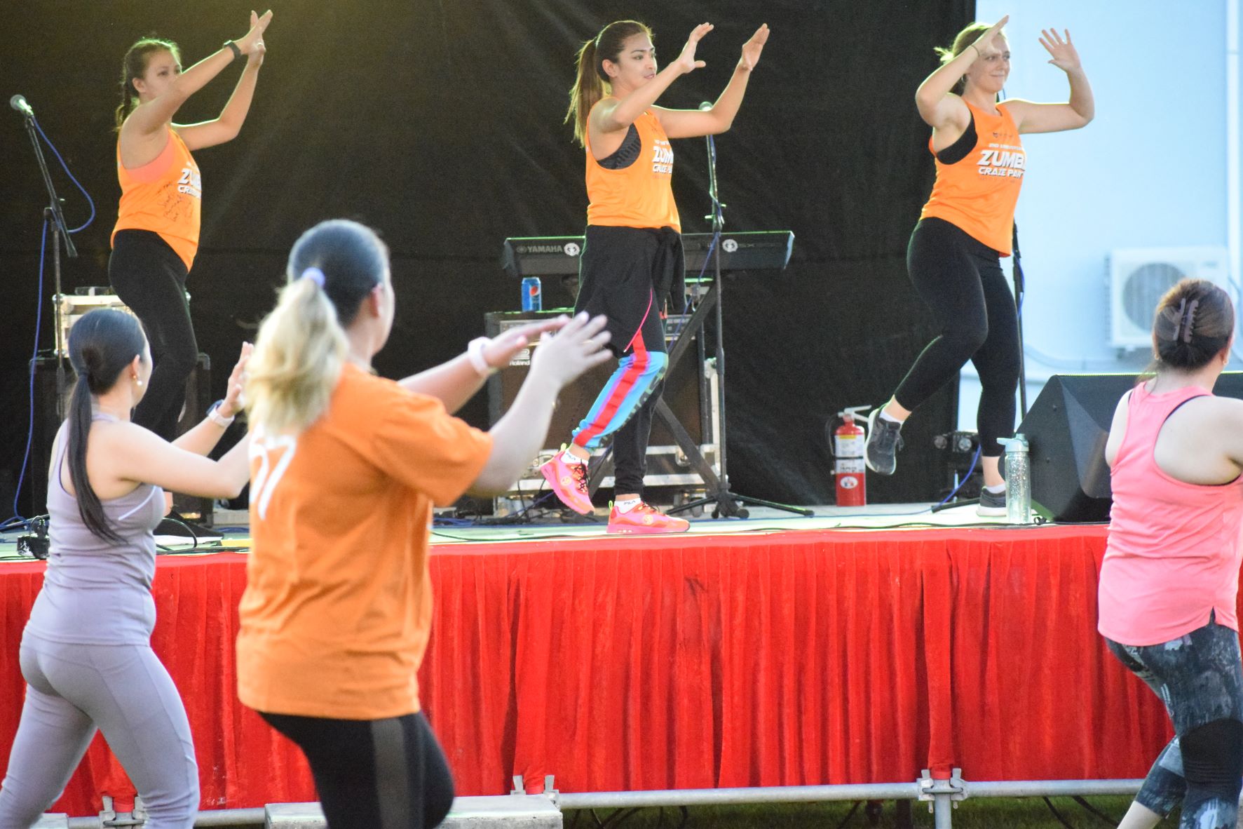 Members of M2 Fitness conduct a Zumba dance workout.