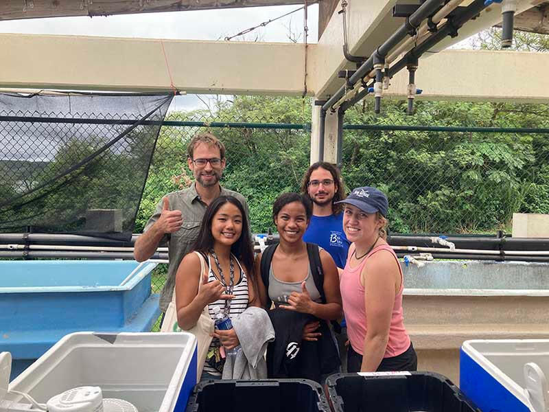 From left, Associate Professor David Combosch, Northern Marianas College interns Subin Cho and Richelle Ramon, Héctor Torrado, postdoctoral researcher, and Mikay Reuter, graduate research assistant.