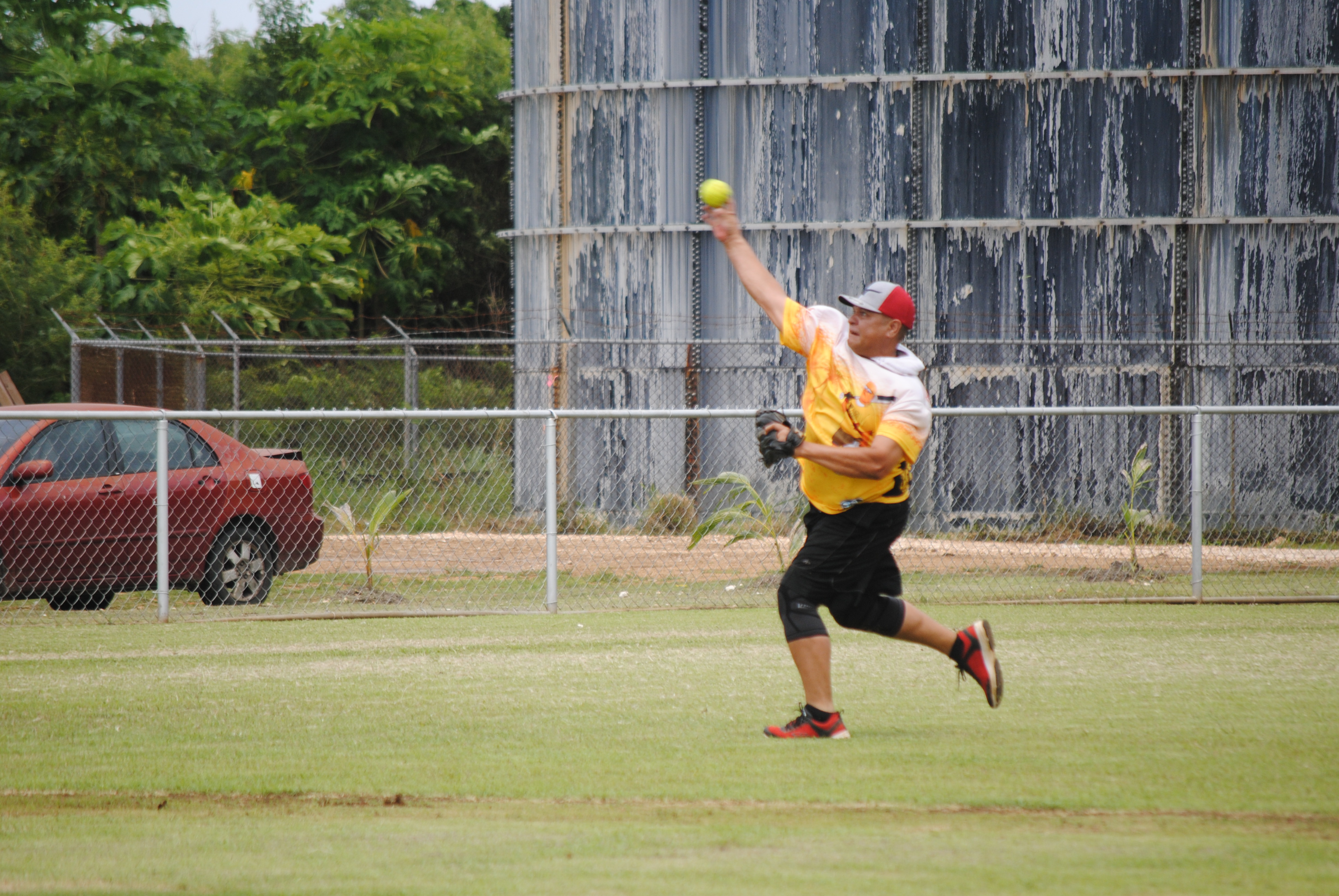 Hagu Lamun second baseman Mitch Aaron throws to home base.