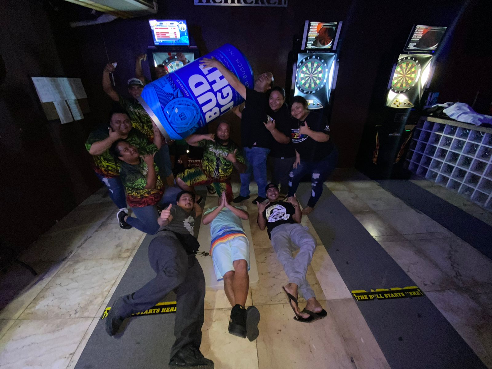 The Bistro Darty Minds and Jonny's Darty Queens pose for a photo following their match Wednesday in the “C” Division of the SEDA Bud Light Dart League at Jonny's Bar.