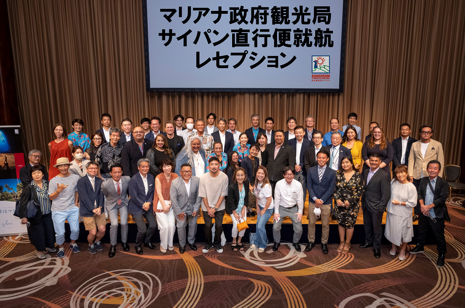 Gov. Ralph Deleon Guerrero Torres, eighth right in the second row, heads a delegation from the Marianas in welcoming representatives of the U.S. Embassy in Tokyo, the Japan Association of Travel Agents, and consumer and travel trade media outlets to a reception on Aug. 31, 2022, in Tokyo, marking the launch of direct flights between Narita and Saipan on Sept. 1, 2022, by United Airlines.