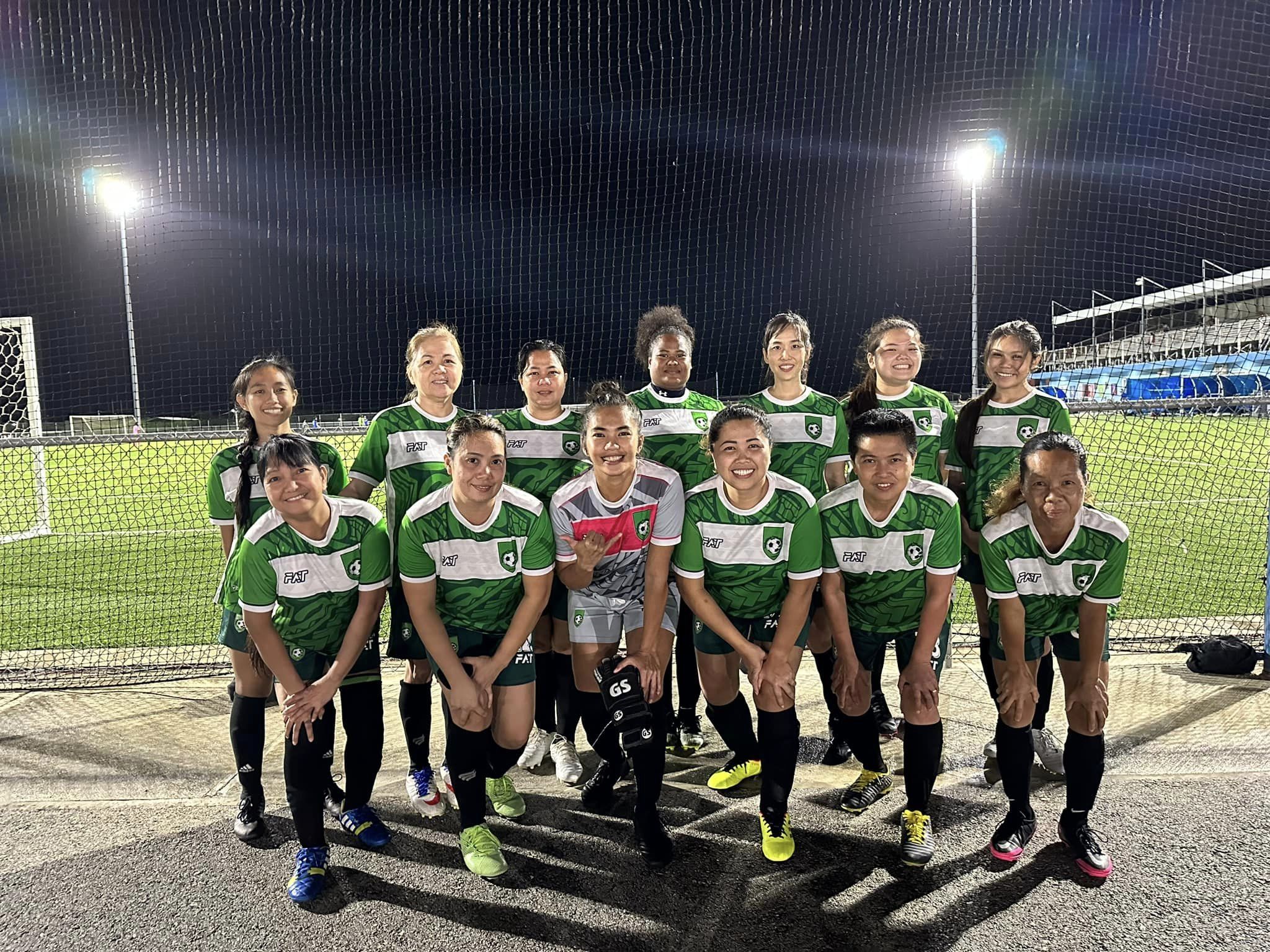 The Tan Holdings Football Club members pose before their match in the Flores-Pee Luwal (Intermediate) Division of the 2022 Dove Women’s League Friday at the NMI Soccer Training Center.