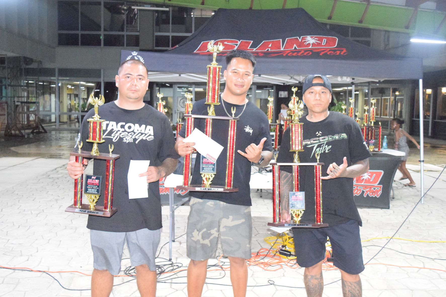 4x4 category first place winner Jesse Jack Salas, center; second placer Robert Cruz, right; and third placer David Lizama.
