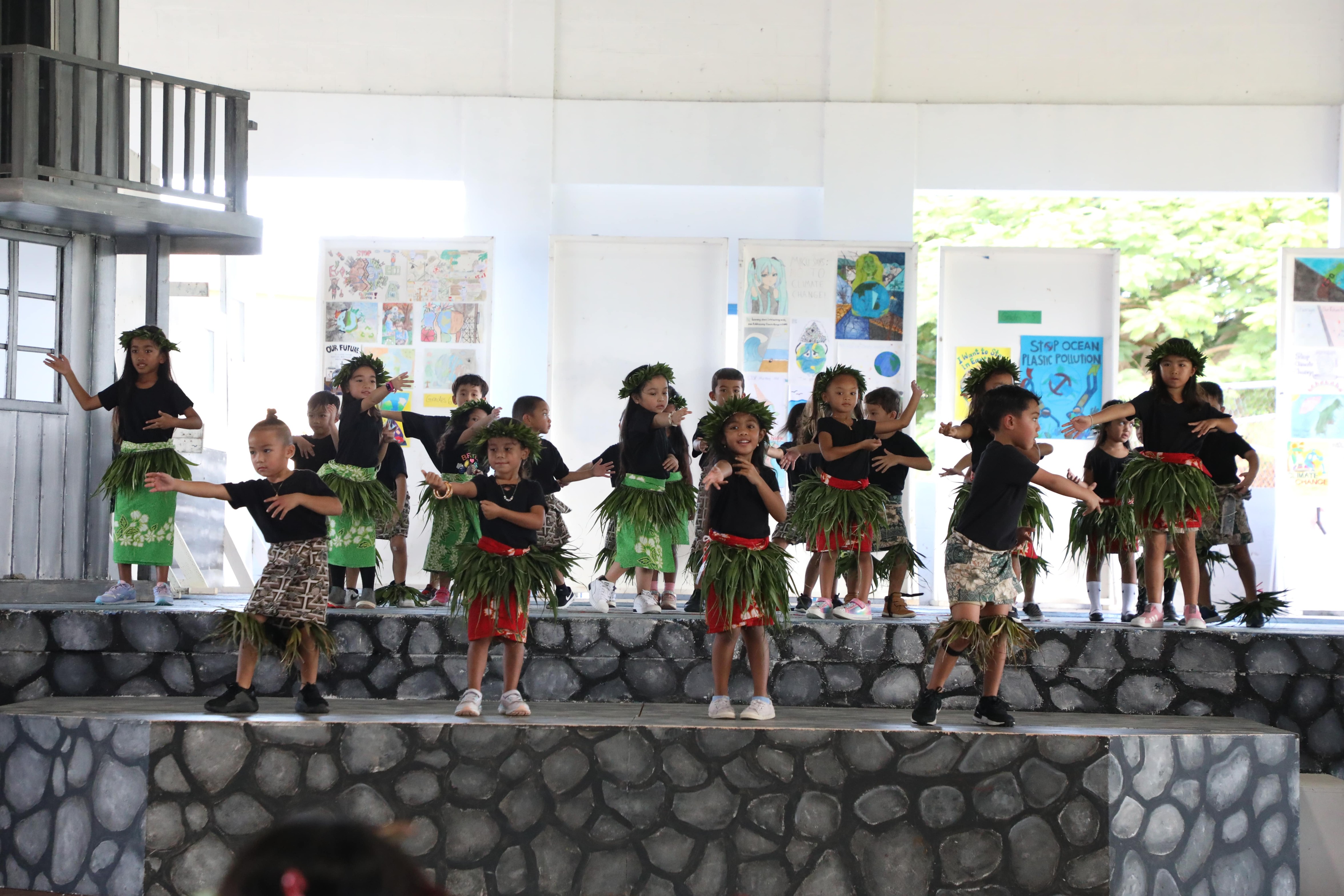 Mount Carmel School's K5 students represent Samoa during the school's Cultural Day celebration.