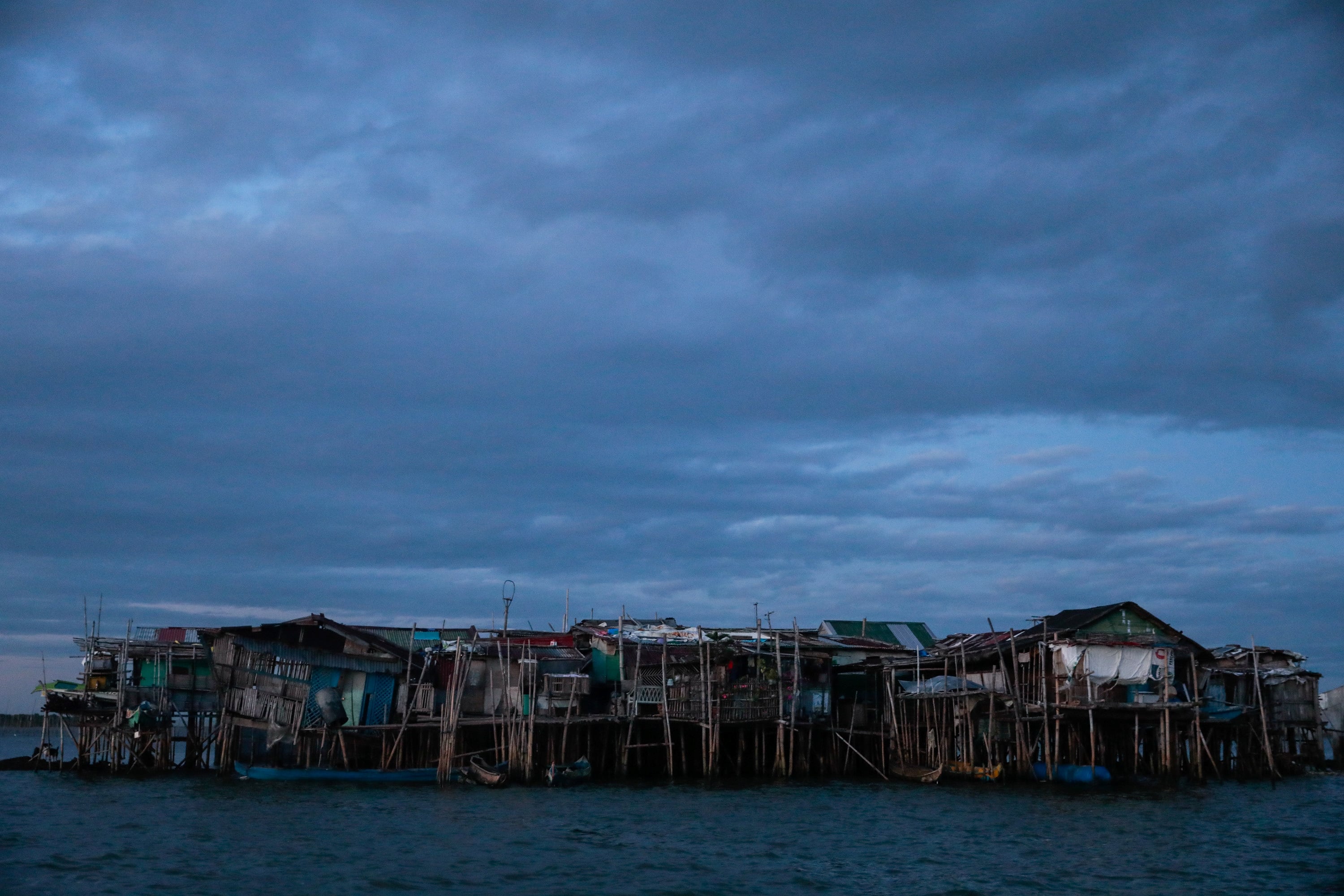 Bamboo huts are risen on stilts in the submerged coastal island of Sitio Pariahan, Bulakan, Bulacan, north of Manila, the Philippines, on Nov. 25, 2019.