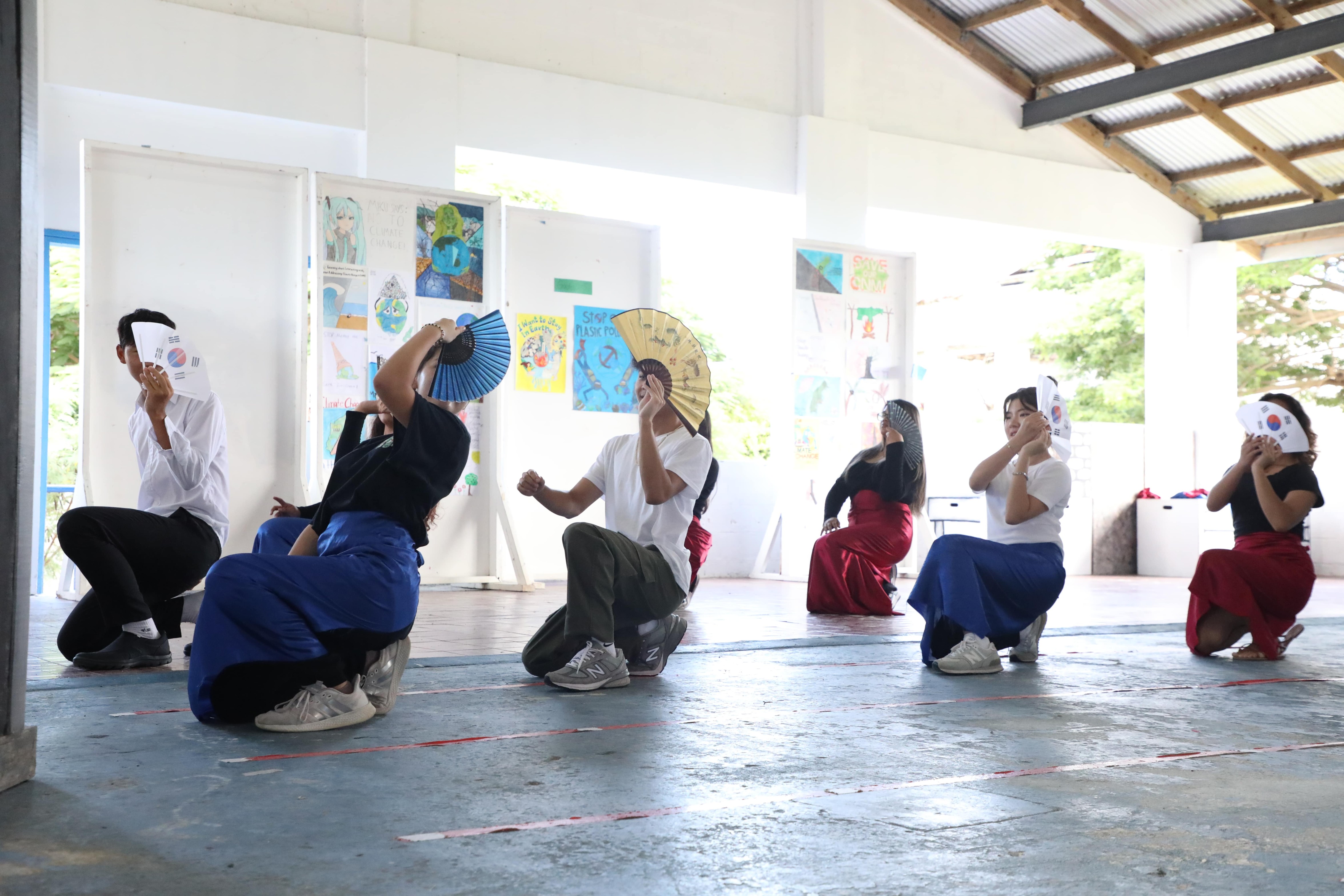 Mount Carmel School's seniors represent South Korea during the school's Cultural Day celebration.