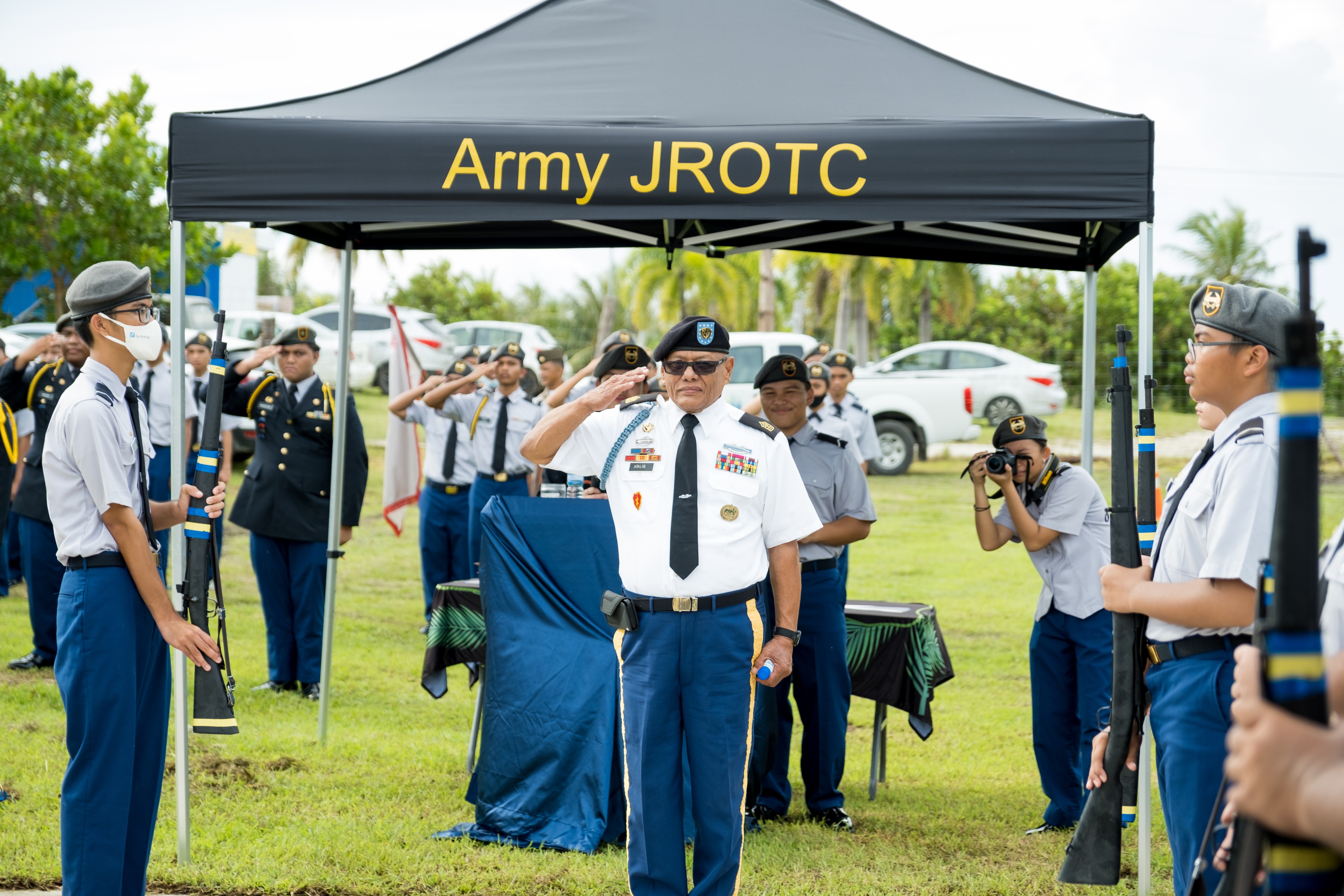 Retired Sgt. Major Herman M. Atalig  with the Rota JROTC cadets.
