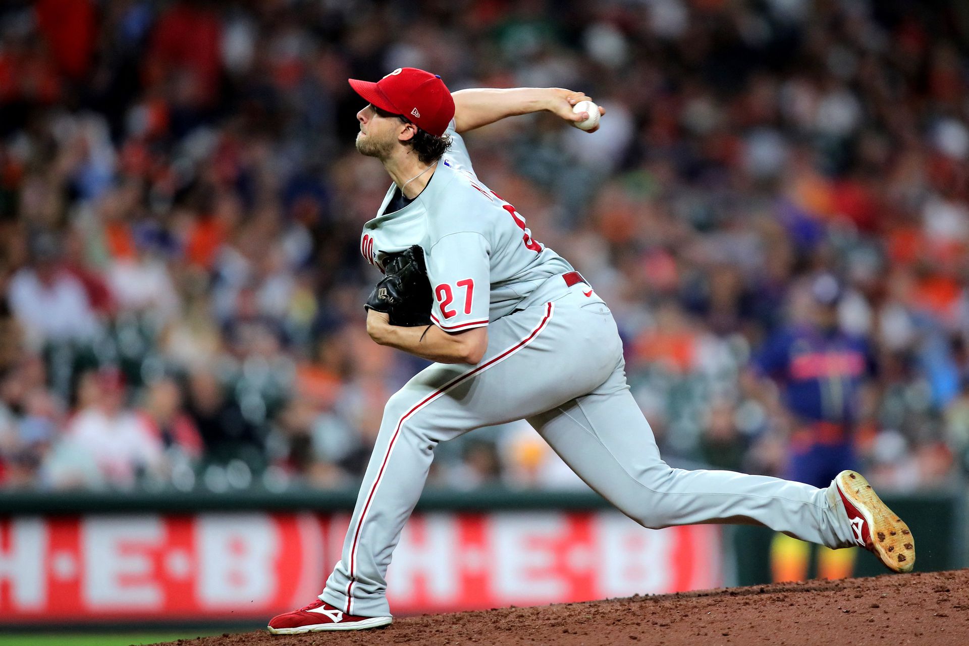 Philadelphia Phillies starting pitcher Aaron Nola (27) delivers a pitch against the Houston Astros during the seventh inning at Minute Maid Park in Houston, Texas, Oct. 3, 2022.