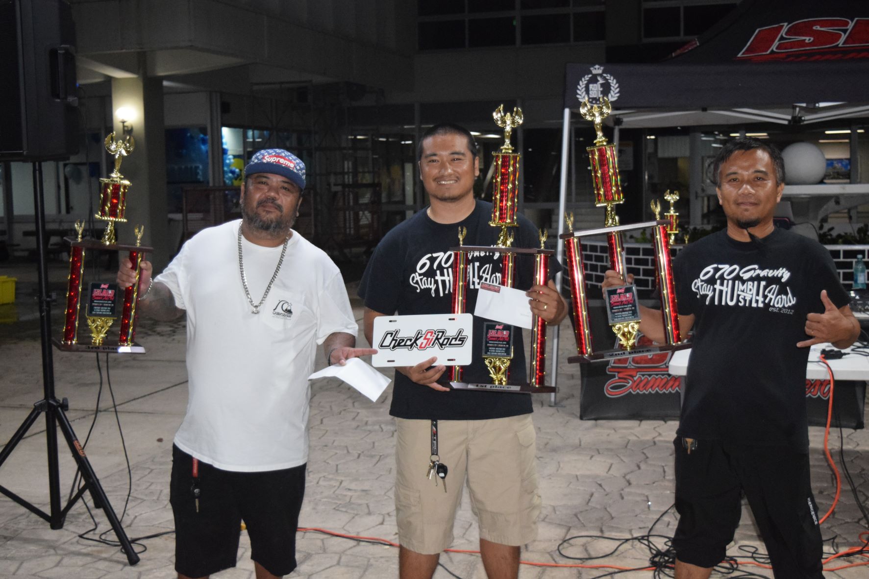 Sound-Off competition first place winner Justine Zapata, center; second placer Jhun Echaure, right; and third placer Gerard Indalecio.