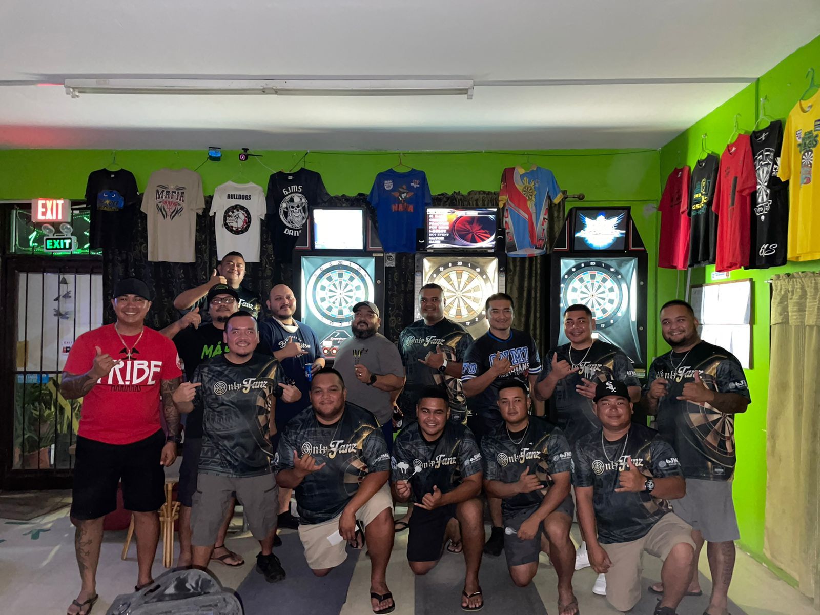 Bistro SIA Who Darted and 6JMS Only Fanz pose for a photo following their Inter-Government Division match in the SEDA Bud Light Dart League at 6JMS Sports Bar.