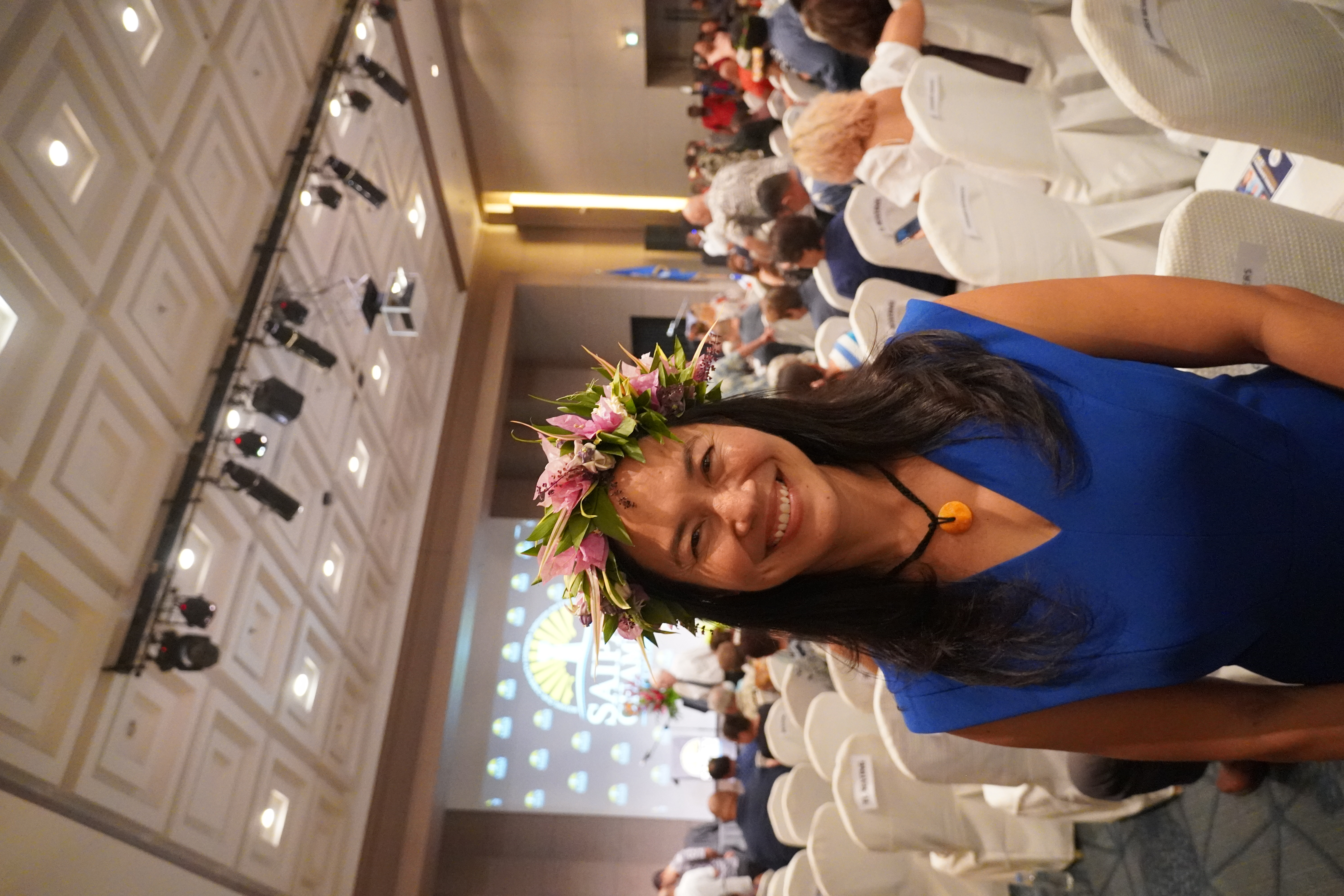 Democratic Rep. Christina Marie Elise "Tina" Sablan smiles during the debate's intermission.