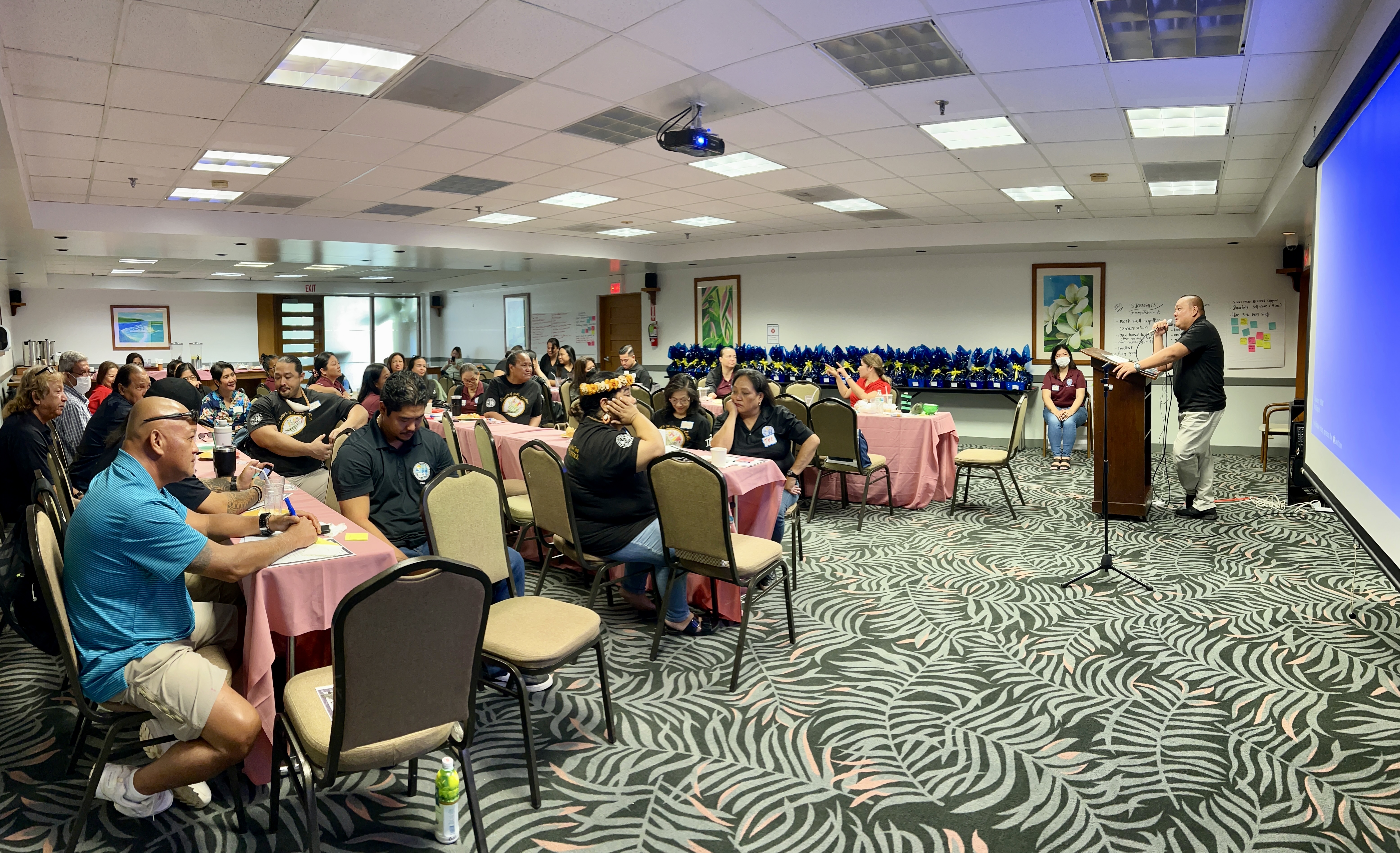 Acting Commissioner of Education Eric Magofna, right, addresses  officials and personnel of PSS’ Federal Program’s Office, Finance and Budget, Procurement and Supply, and Human Resources Office.