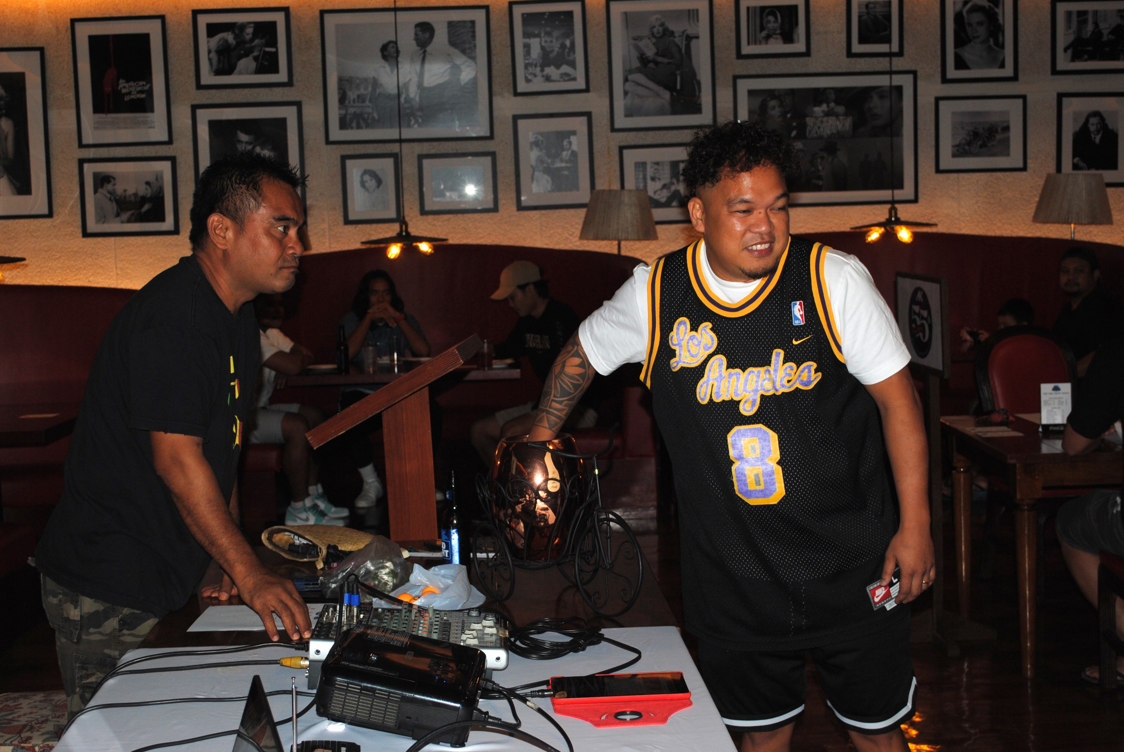 La Mesa Kusina assistant coach Jun Hernandez reaches for a number during draft night of the IT&E MIBL Fantasy Draft Tournament Saturday at Aqua Resort Club.