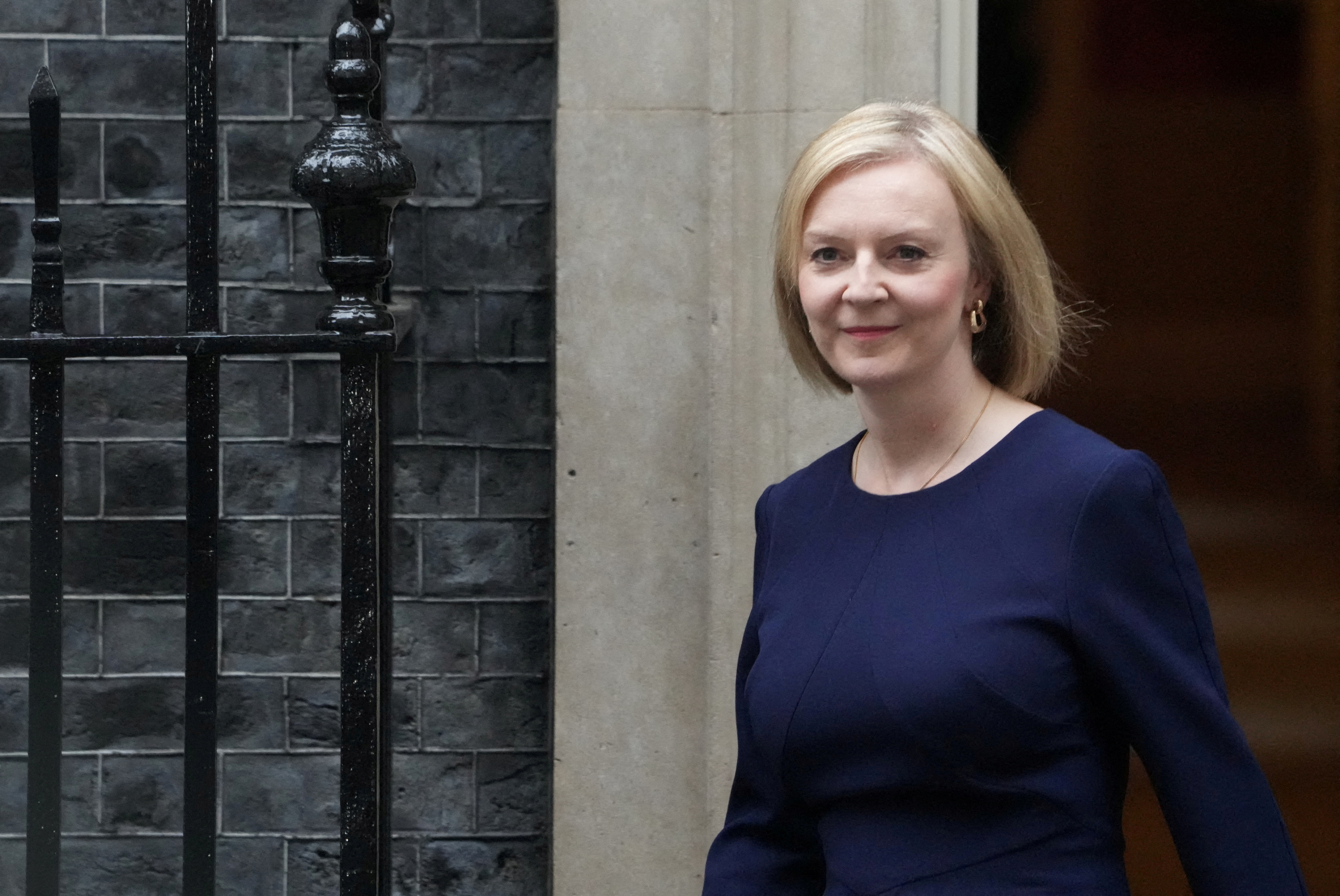 Britain's Prime Minister Liz Truss walks outside Downing Street in London, Britain, Sept. 23, 2022.