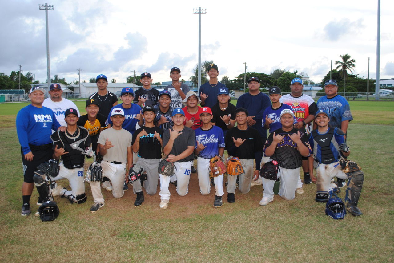 Ballplayers pose for a photo during a break from the NMI U18 Junior National Team tryouts.