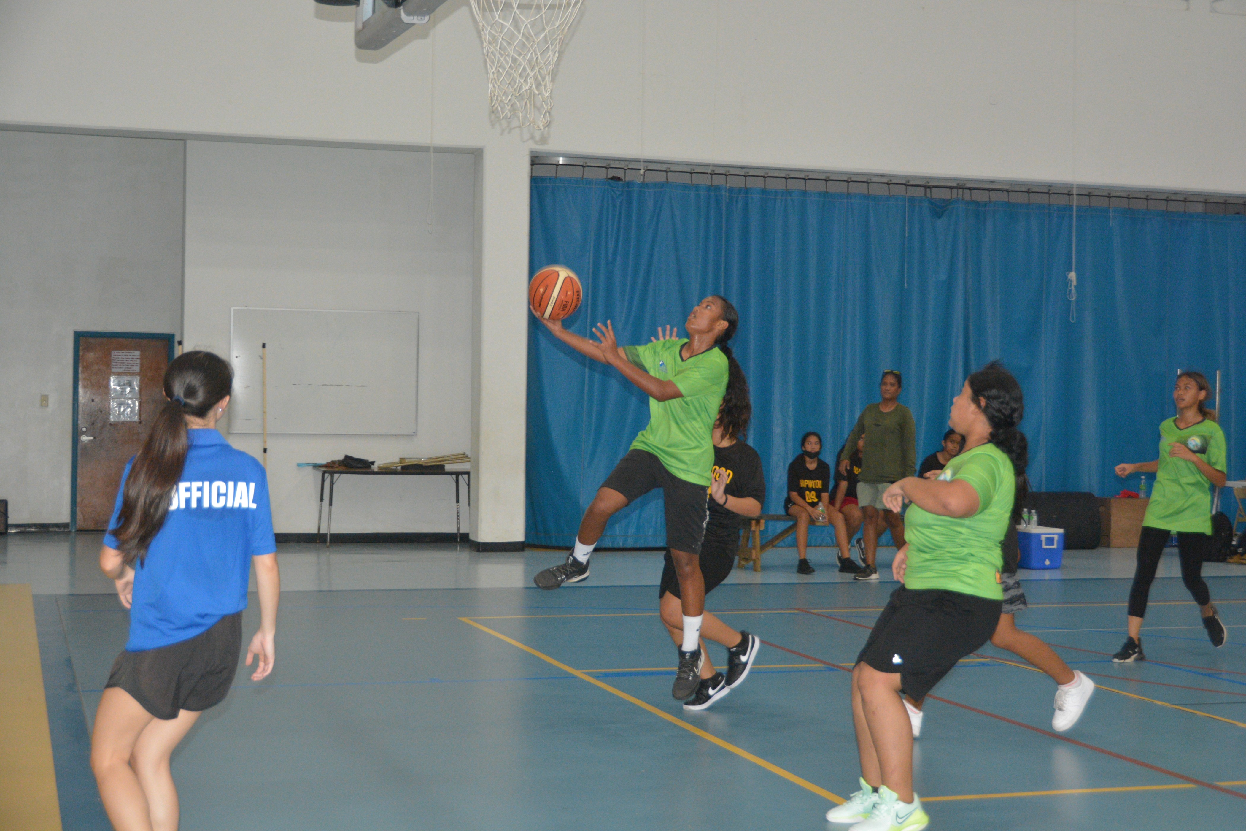 A Chacha Oceanview Middle School player rises up for the layup during a girls middle school division game of the IT&E Interscholastic Basketball League at the MHS gym.