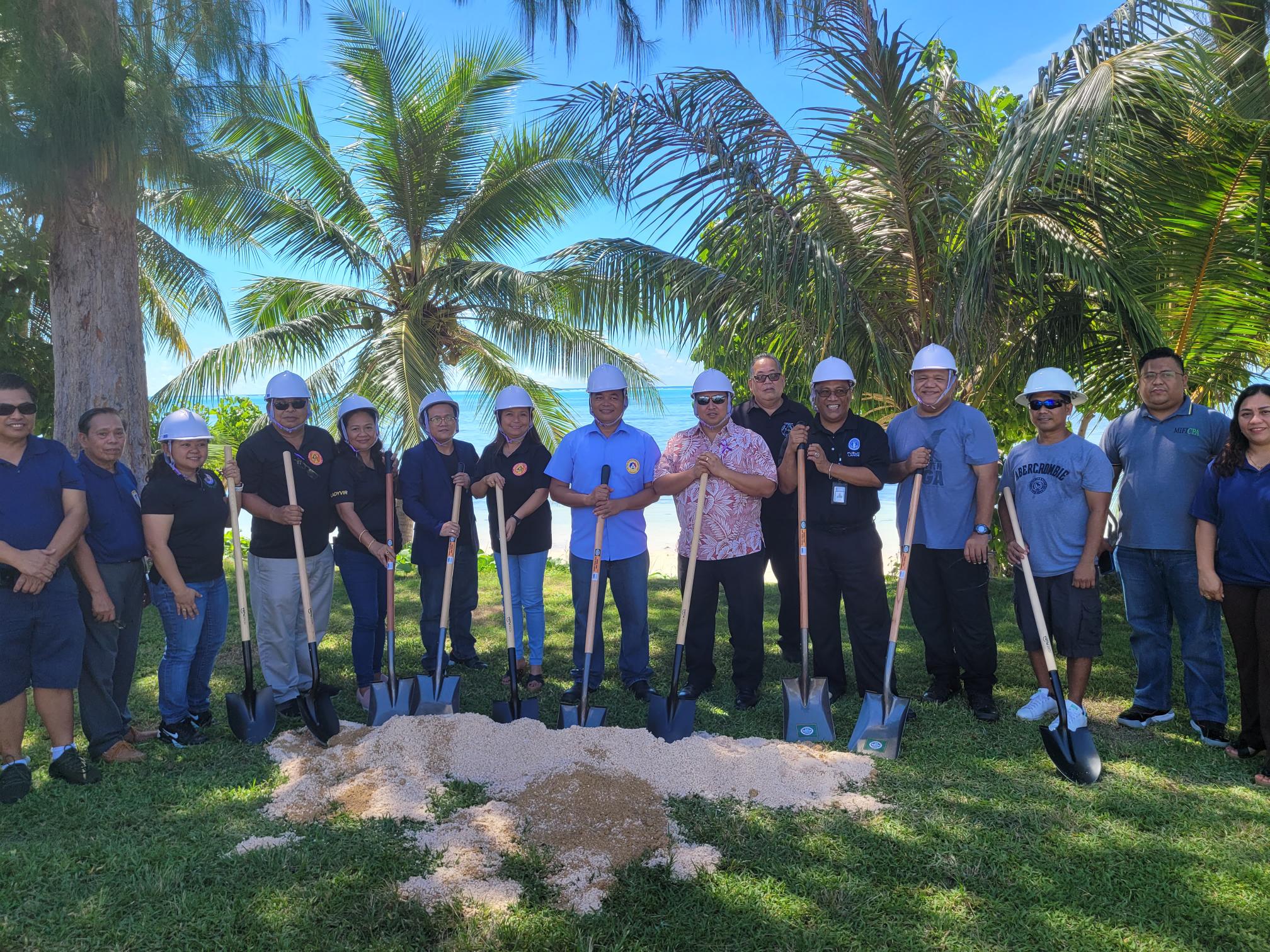 Governor Ralph DLG Torres, Department of Public Lands Secretary Sixto Igisomar and Department of Land and Natural Resources Acting Director Gus Kaipat pose for a photo with United Filipino Organization President Mar Masilungan and representatives and officers of UFO’s member organizations prior to a groundbreaking ceremony for the UFO pavilion on Beach Road, Garapan Thursday afternoon. 