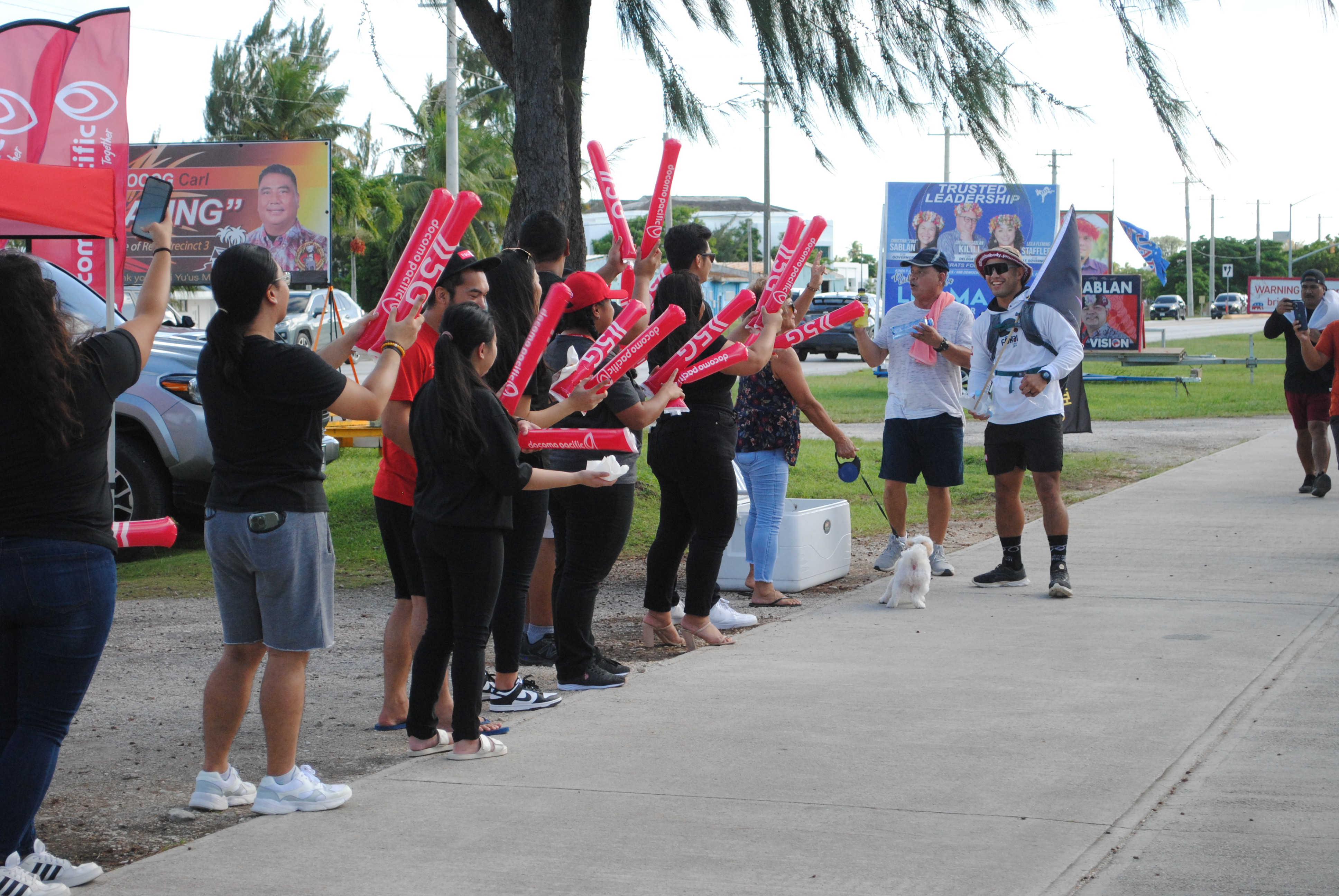 Frank “The Crank” Camacho greets supporters during his trek around Saipan Friday at the Minachom Atdao.