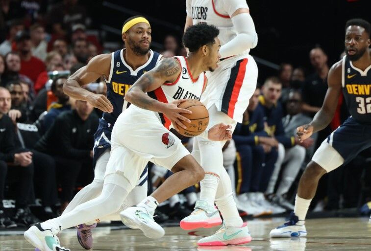 Portland Trail Blazers guard Anfernee Simons (1) dribbles against the Denver Nuggets in the second half at Moda Center in Portland, Oregon, Oct. 24, 2022.