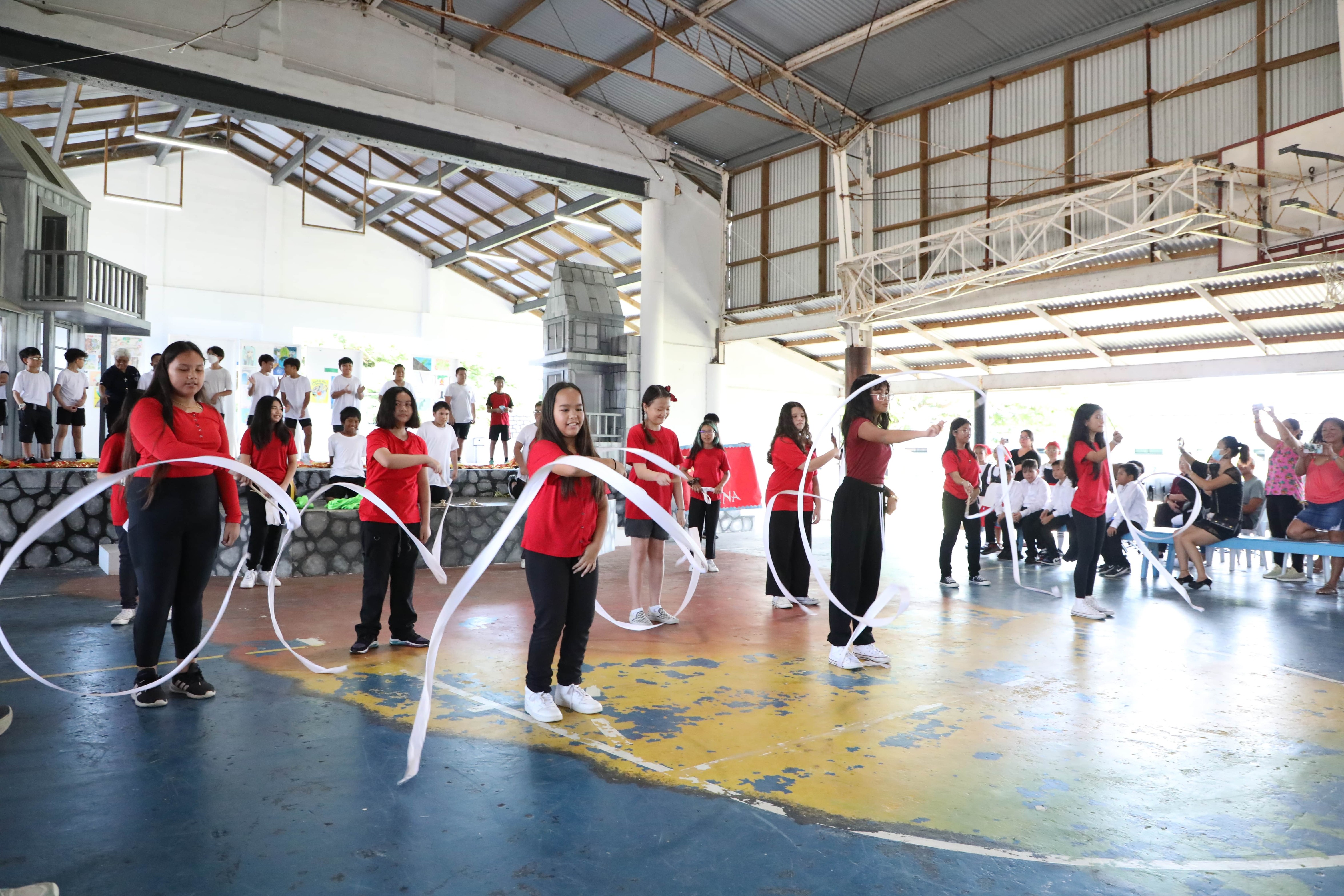 Mount Carmel School's sixth-grade students represent China during the school's Cultural Day celebration.