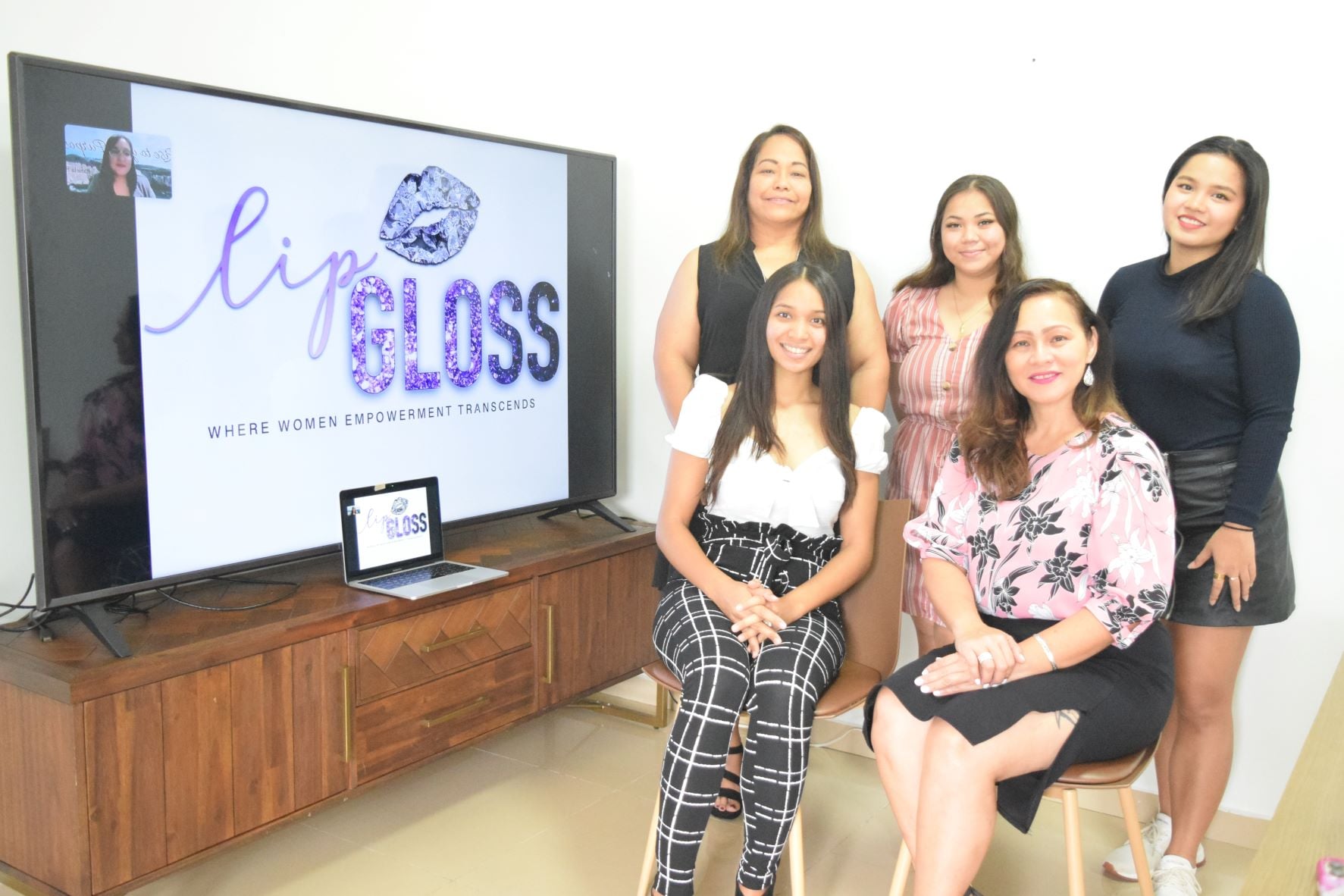 Lip Gloss Founder and Chief Executive Officer Maryann Borja-Arriola, right seated; President Frances Santos, left, back row; Vice President Darsha Camacho, left seated; Secretary Tiana Villagomez, center; and Treasurer Hazel Sadian pose for photo after their board meeting in Garapan on Sunday. On the screen is the group’s public information officer, Rafaela Enoé Fiallos Bertrand.