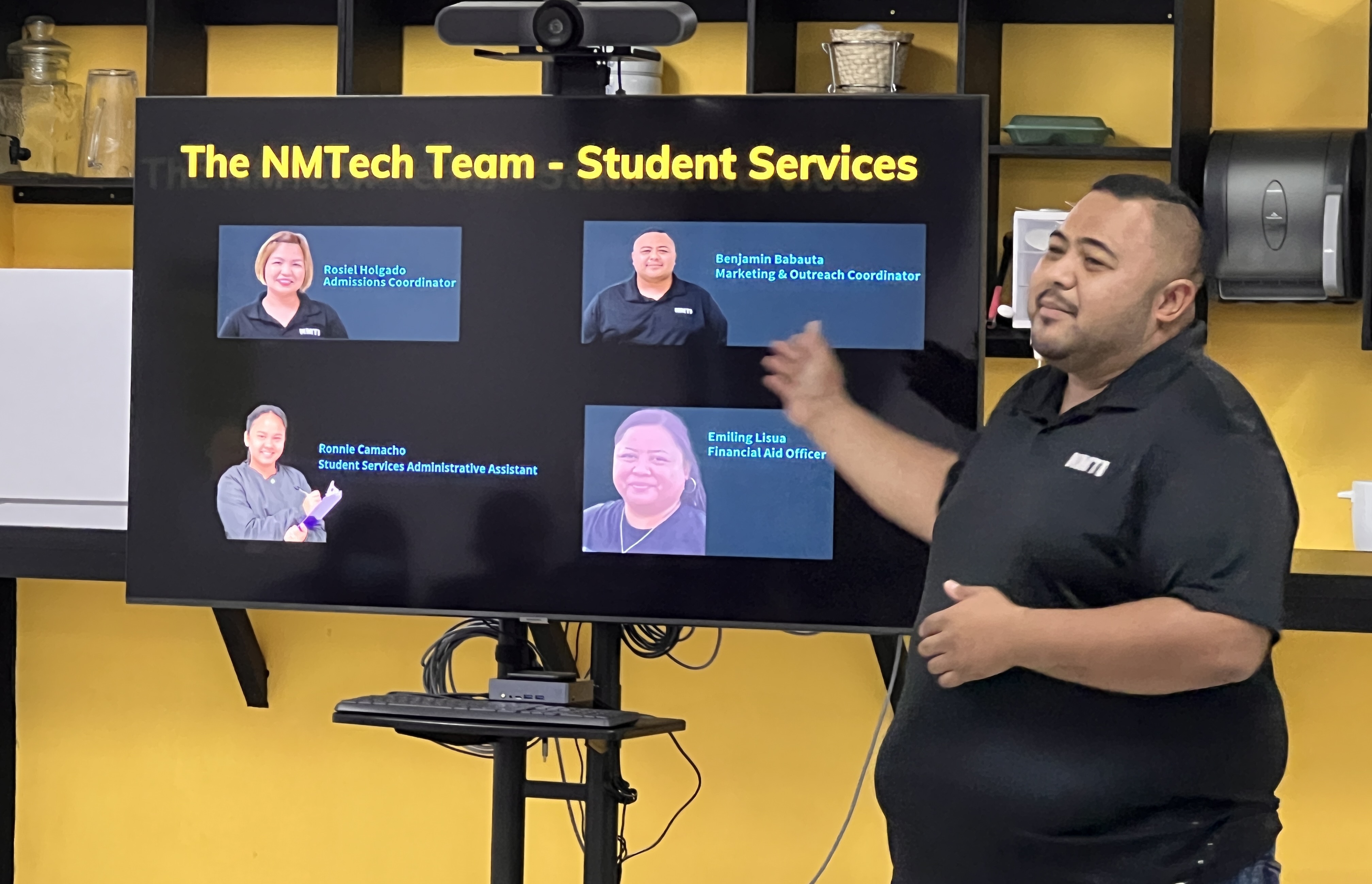 NMTech’s culinary instructor Ben Babauta Jr. introduces NMTech’s team to the Tanapag Middle School students and parents.