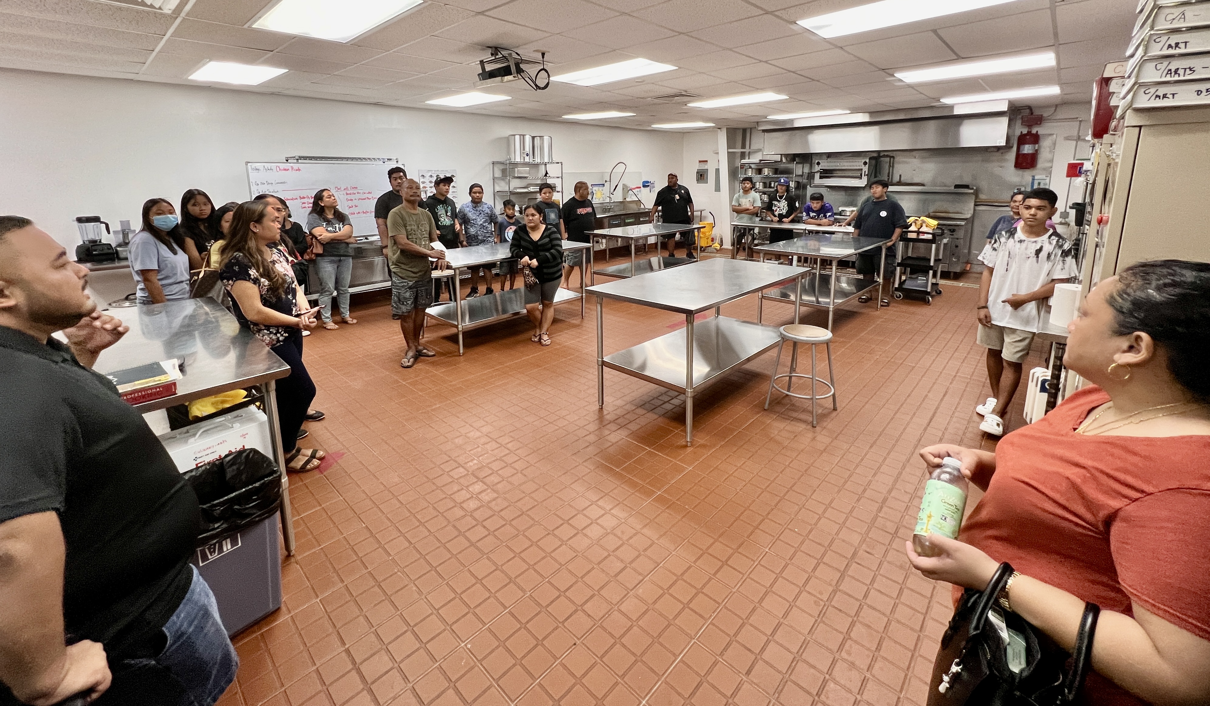 Tanapag Middle School  students tour the facilities of NMTech, including the culinary program’s professional kitchen/classroom.