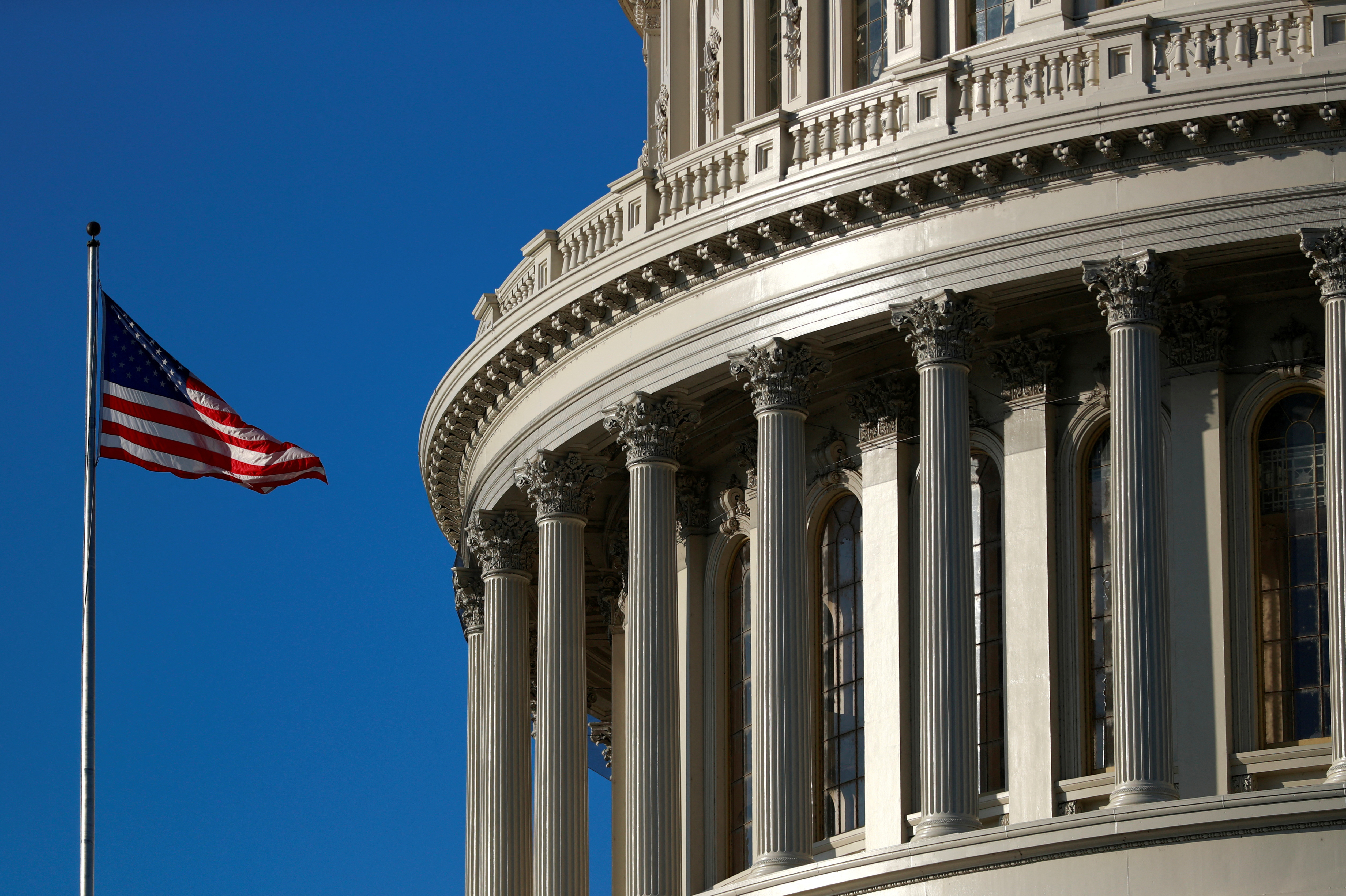An American flag flies outside of the U.S. Capitol dome in Washington, D.C., Jan. 15, 2020.