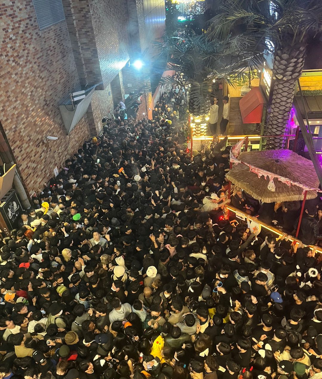 A street in Itaewon district is pictured full of people before a stampede during Halloween festivities that killed and injured many in Seoul, South Korea on Oct. 30, 2022.