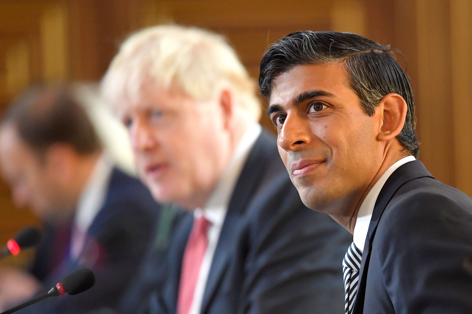 Rishi Sunak attends a cabinet meeting of senior government ministers in London, Sept. 1, 2020.