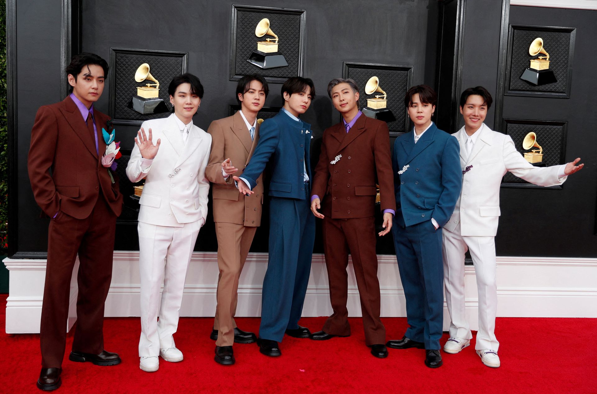 BTS pose on the red carpet as they attend the 64th Annual Grammy Awards at the MGM Grand Garden Arena in Las Vegas, Nevada, April 3, 2022.