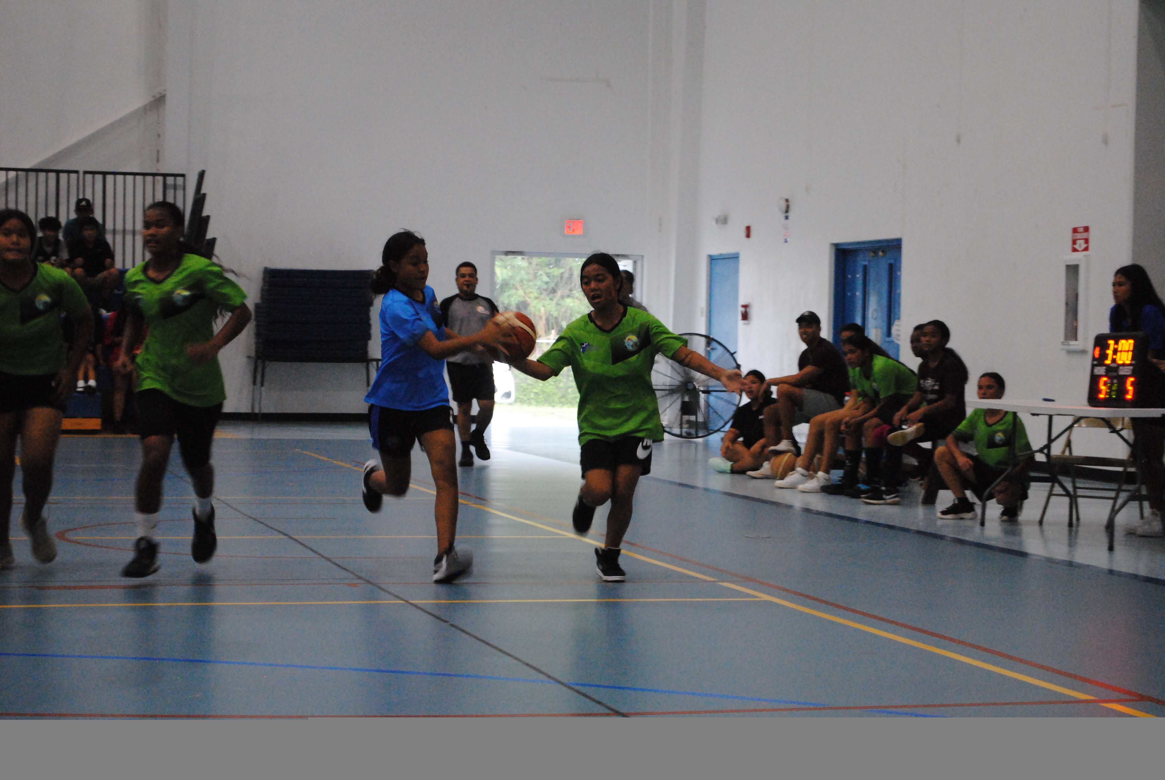 An FMS player steals the ball  during a Girls Middle School Division game of the IT&E Interscholastic Basketball League at the MHS gym.