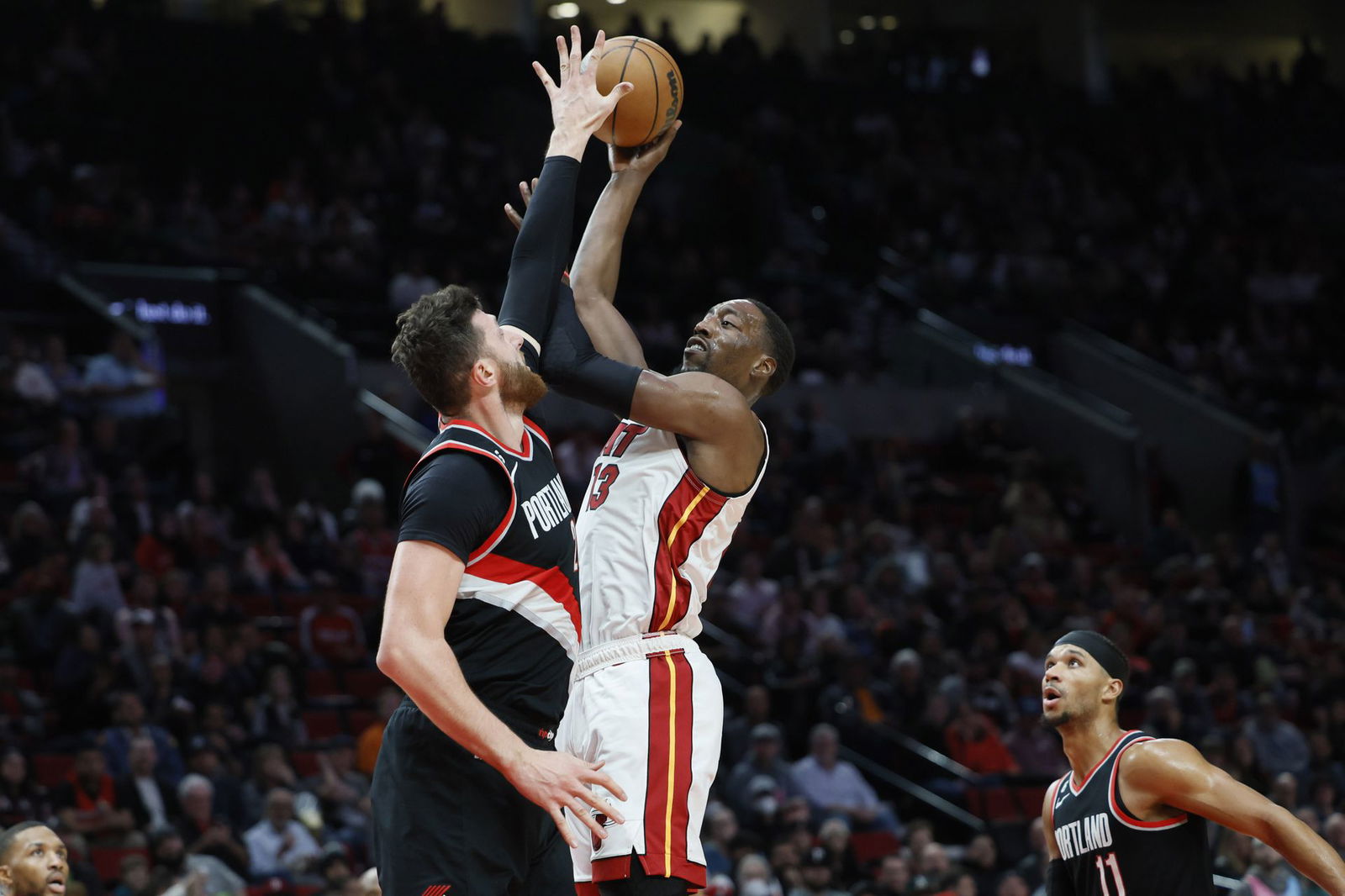 Miami Heat center Bam Adebayo (13) puts up a shot over Portland Trail Blazers center Jusuf Turkic (27) during the second half at Moda Center in Portland, Oregon,  Oct. 26, 2022.