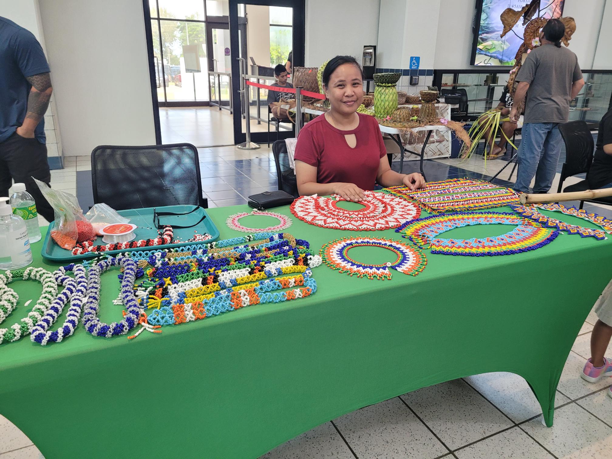 At the bead-making table.
