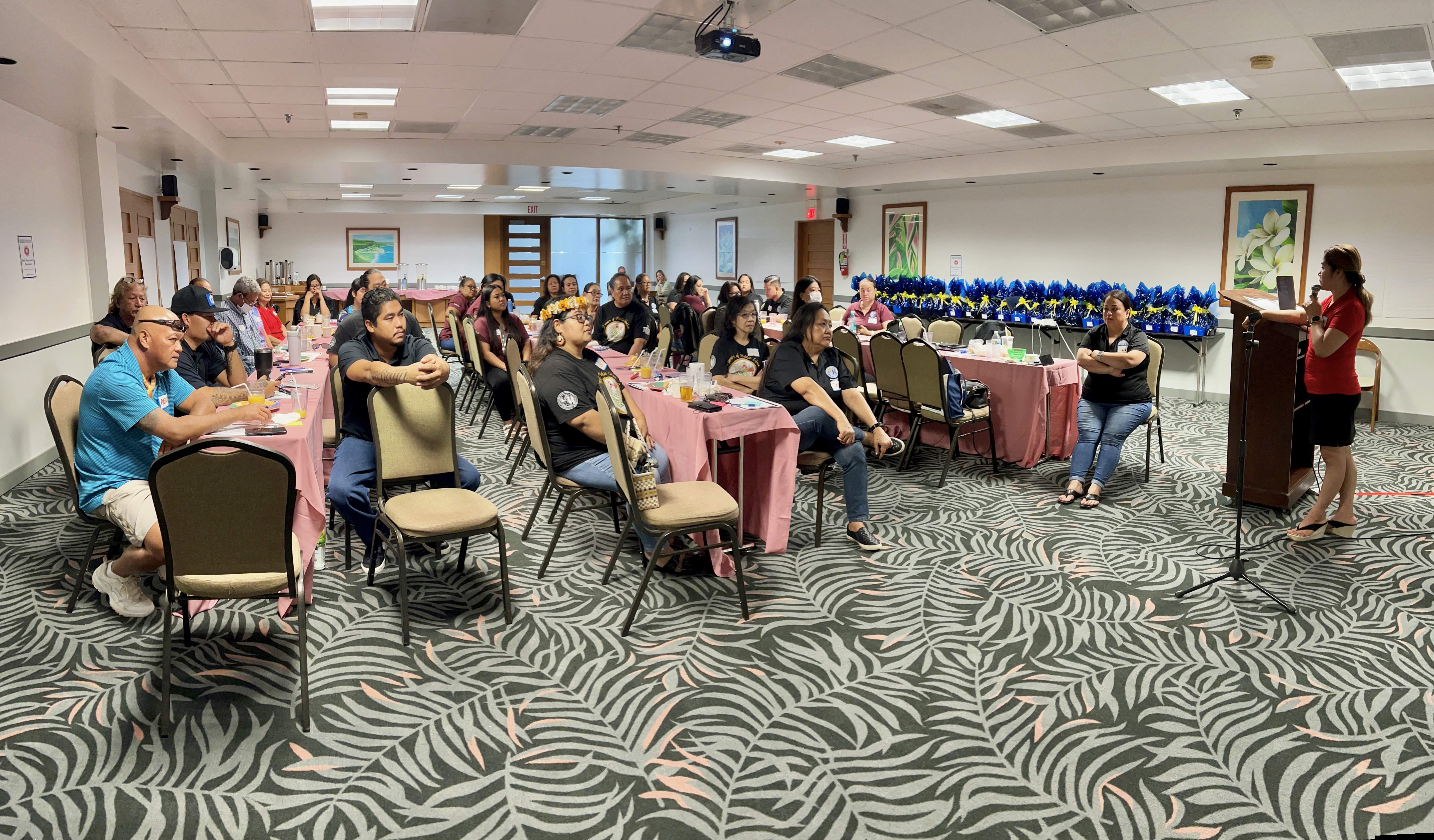 Finance and Budget Director Arlene Lizama, right, talks about the importance of teamwork and collaboration in the delivery of public education services.