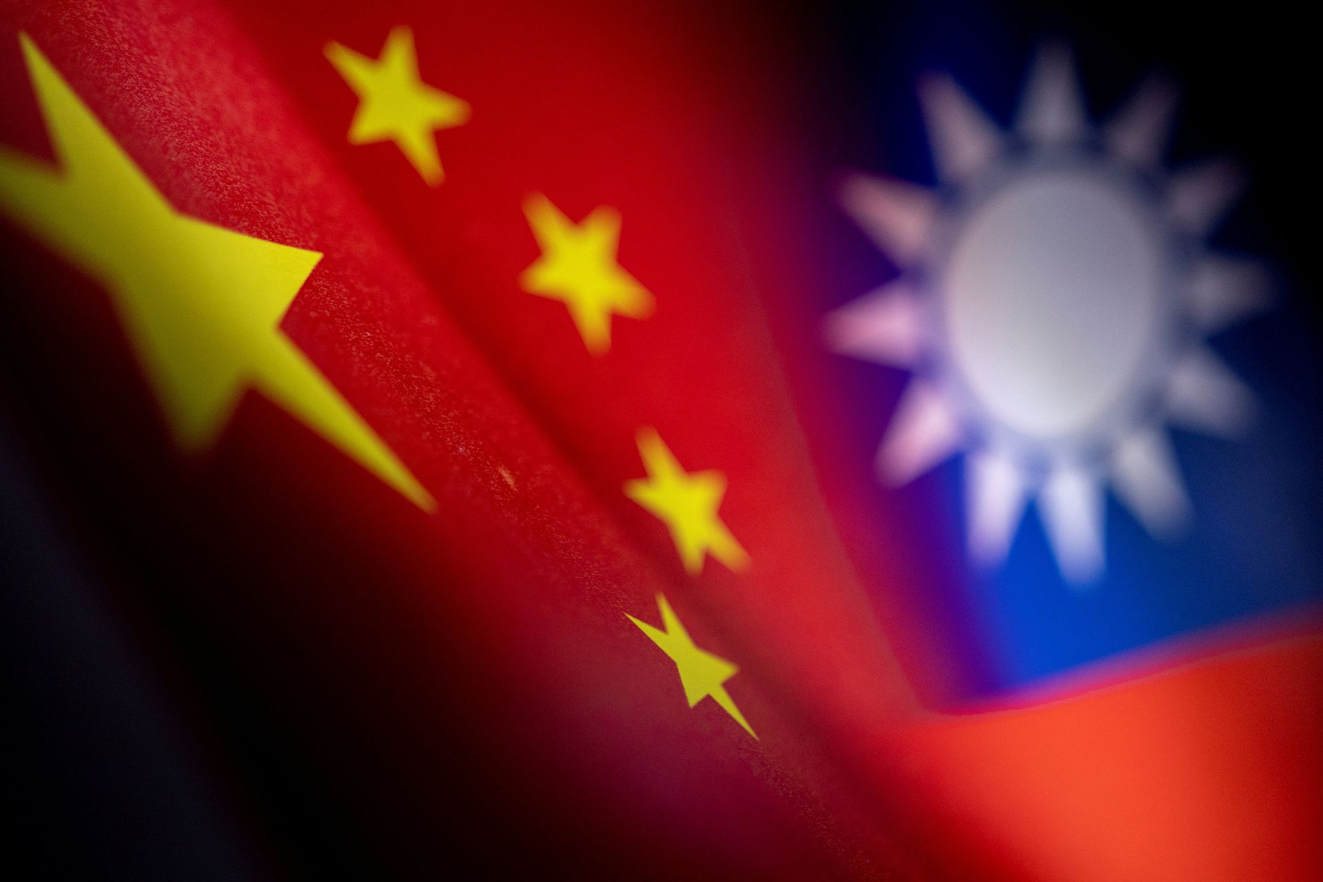 Chinese and Taiwanese printed flags are seen in this illustration taken on April 28, 2022.