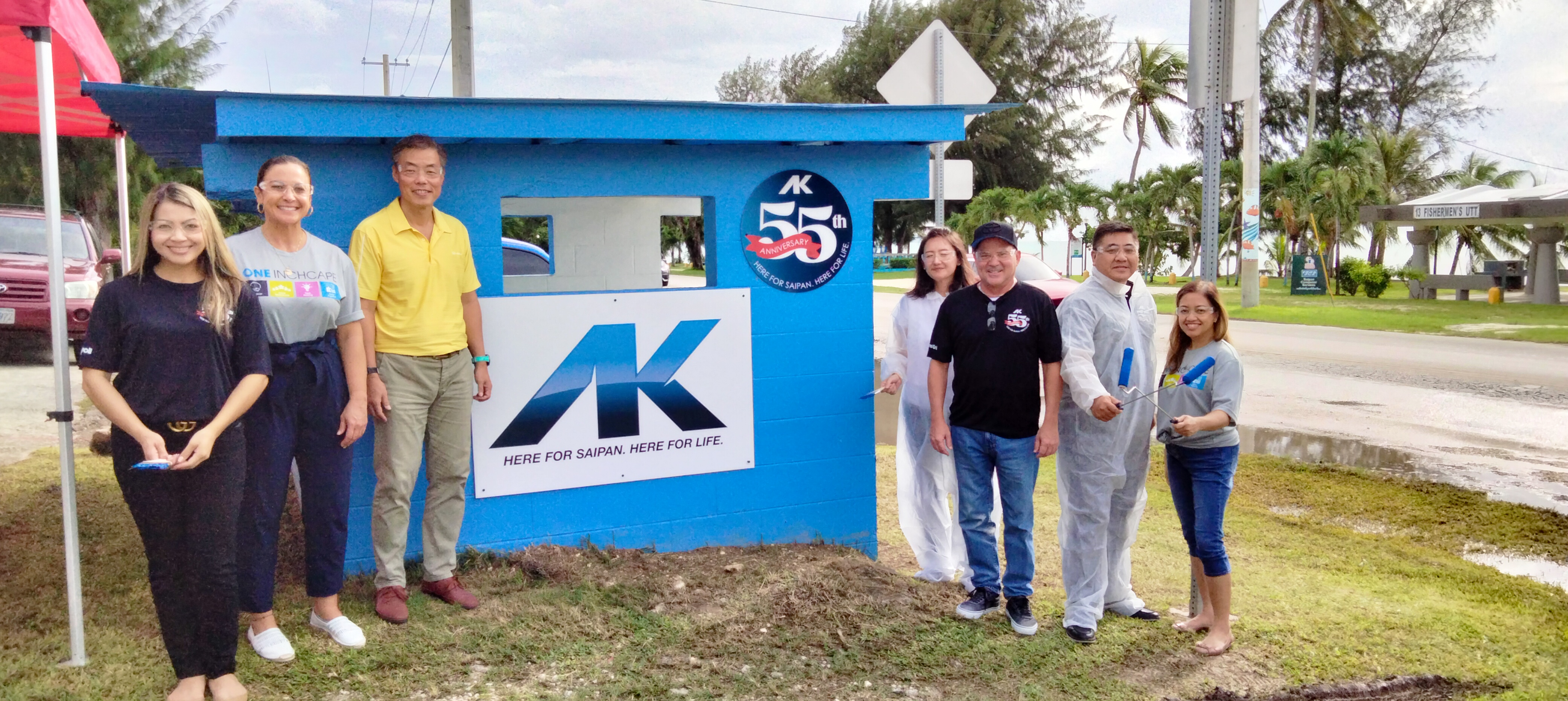 The Atkins Kroll executive team poses for a photo at a renovated  school bus stop shelter in Garapan. From left, Trina Cruz, marketing and communications director;  Tracy Guerrero, operations director; Alex Yap, president, Atkins Kroll Guam and Saipan;  Julie Lee, director of finance;  Joel Lesh, general manager AK Saipan/vice president Atkins Kroll Guam and Saipan;  Arnold Sikat, aftersales director; and Daphne Leon Guerrero, human resources director.