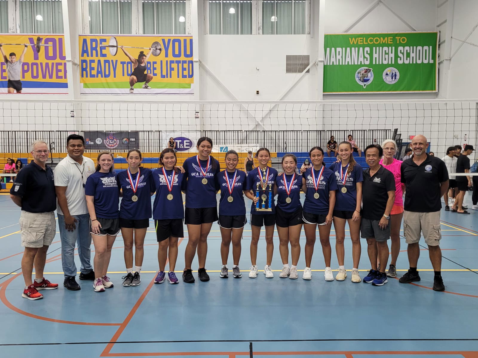 The Grace Christian Academy Lady Eagles pose  after earning their sixth straight NMIVA-PSS Girls High School Volleyball championship Saturday at the MHS gym.