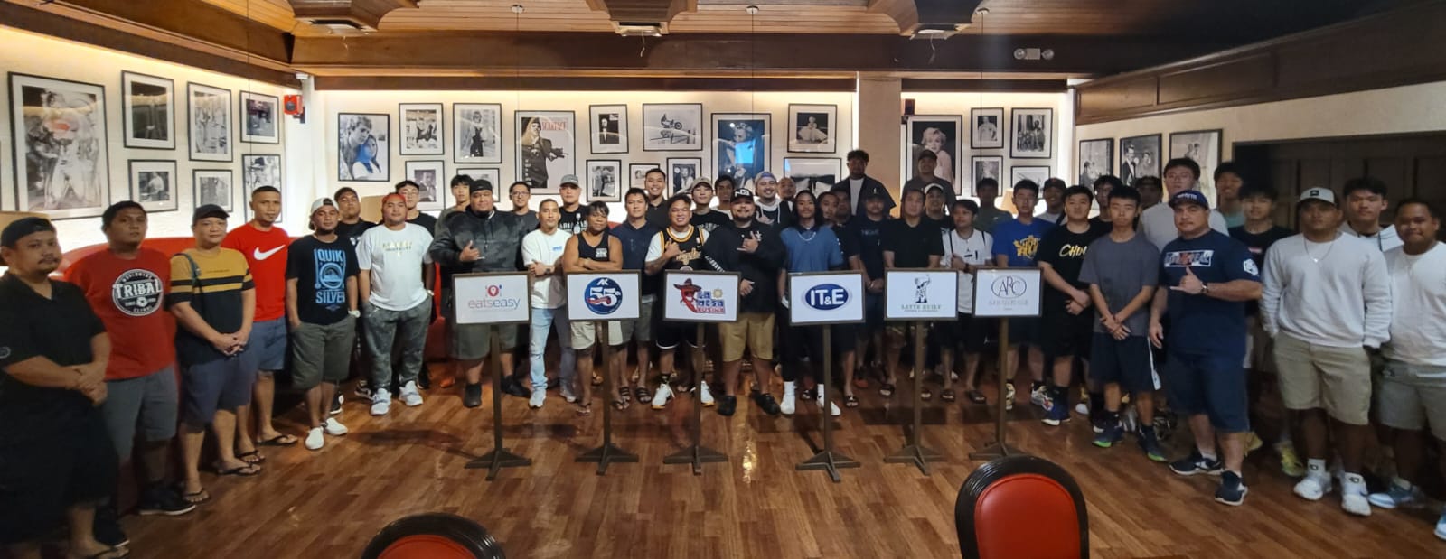 Players and coaches pose for a photo after completing the draft night of the IT&E MIBL Fantasy Draft Tournament Saturday at Aqua Resort Club.