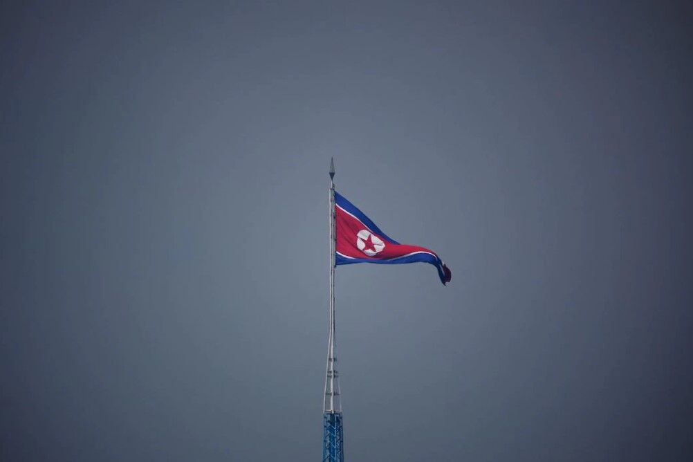 A North Korean flag flutters at the propaganda village of Gijungdong in North Korea, in this picture taken near the truce village of Panmunjom inside the demilitarized zone  separating the two Koreas, July 19, 2022.