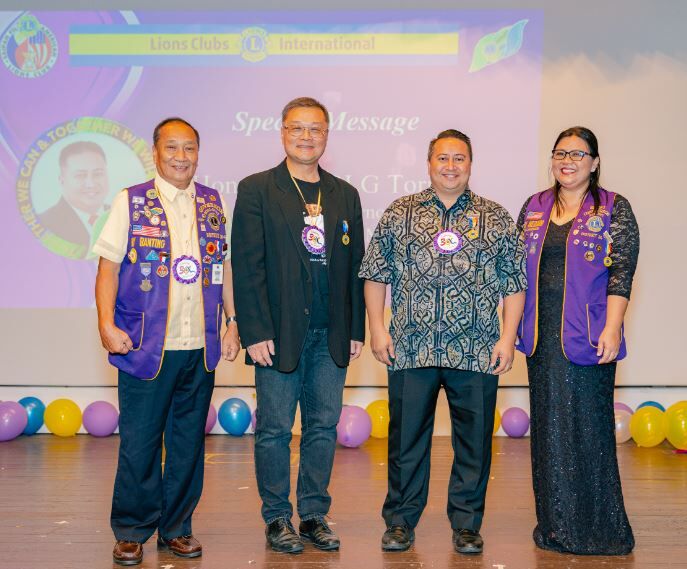Governor Ralph Deleon Guerrero Torres and Saipan Fil-American Lions Club pioneering president, businessman and philanthropist Jerry Tan with immediate past District Governor Saturnino “Atoy” Banting and club administrator Eden Mercado.