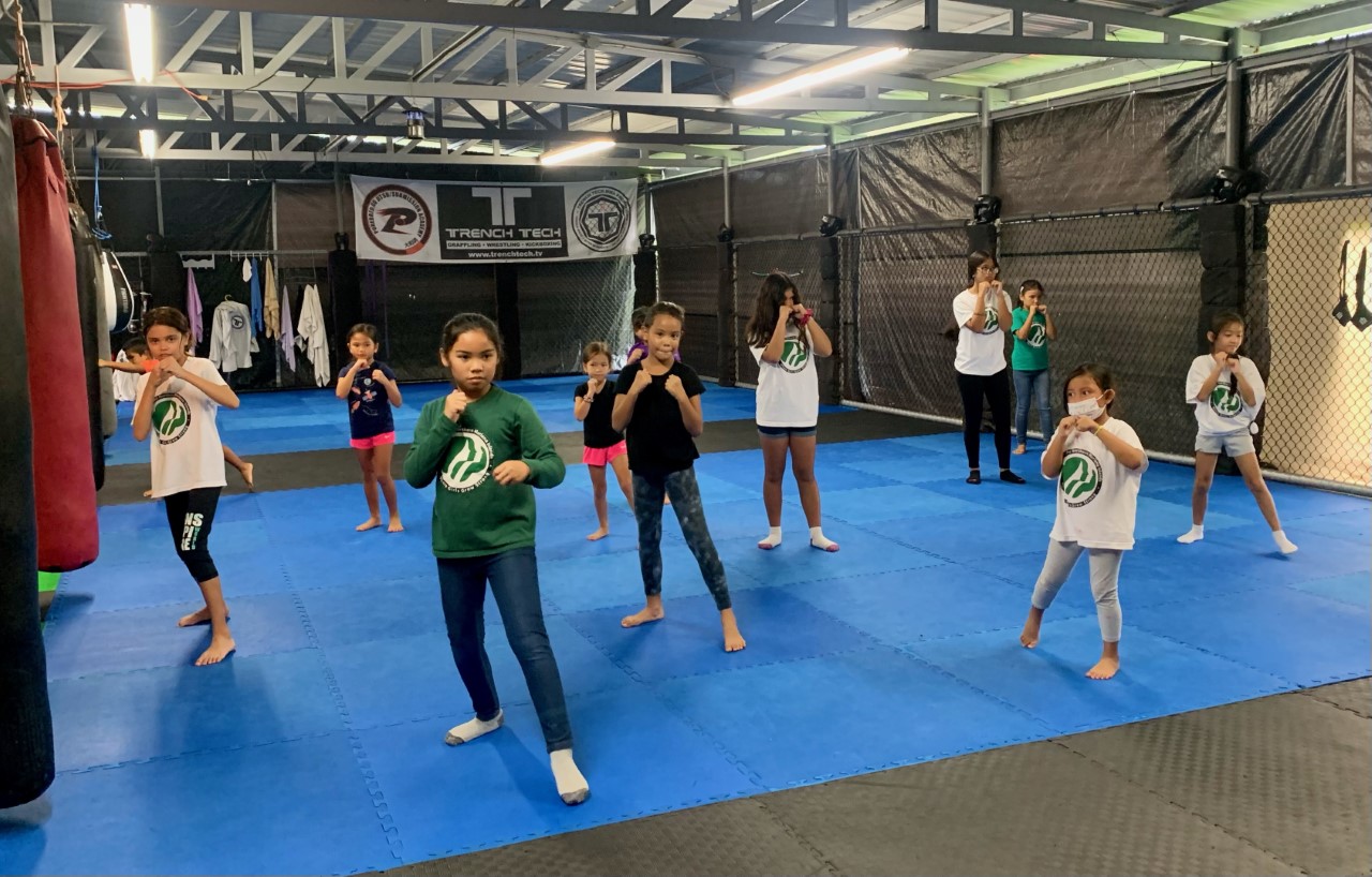 The NMI Girl Scouts participate in a self-defense session at Trench Tech Gym in Garapan on Saturday, Oct. 8.